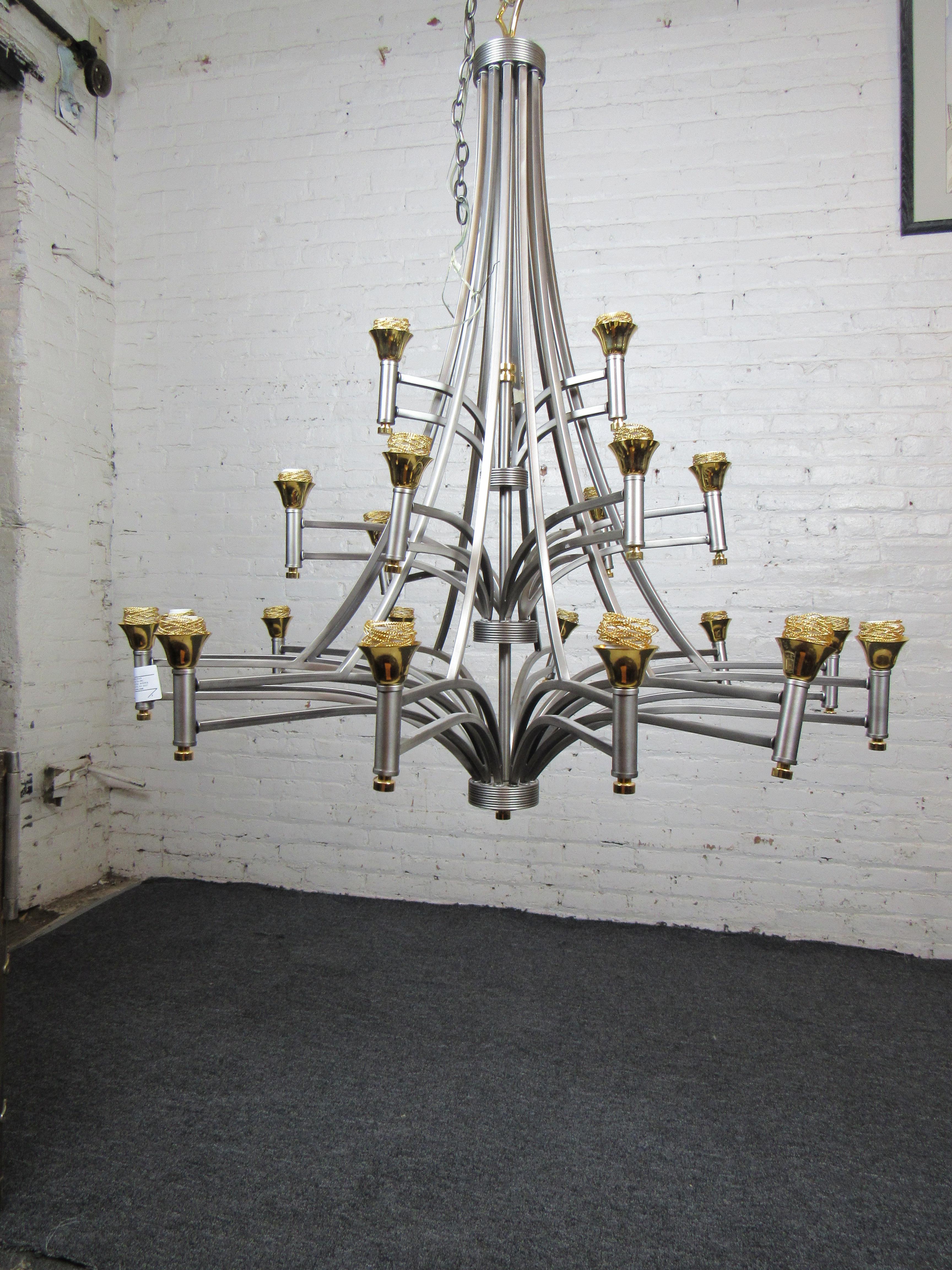 This elaborate and large chandelier features three tiers of metal supports for a unique look. This vintage piece can serve as the stylish focal point of a room while providing abundant lighting. Please confirm item location with seller (NY/NJ).