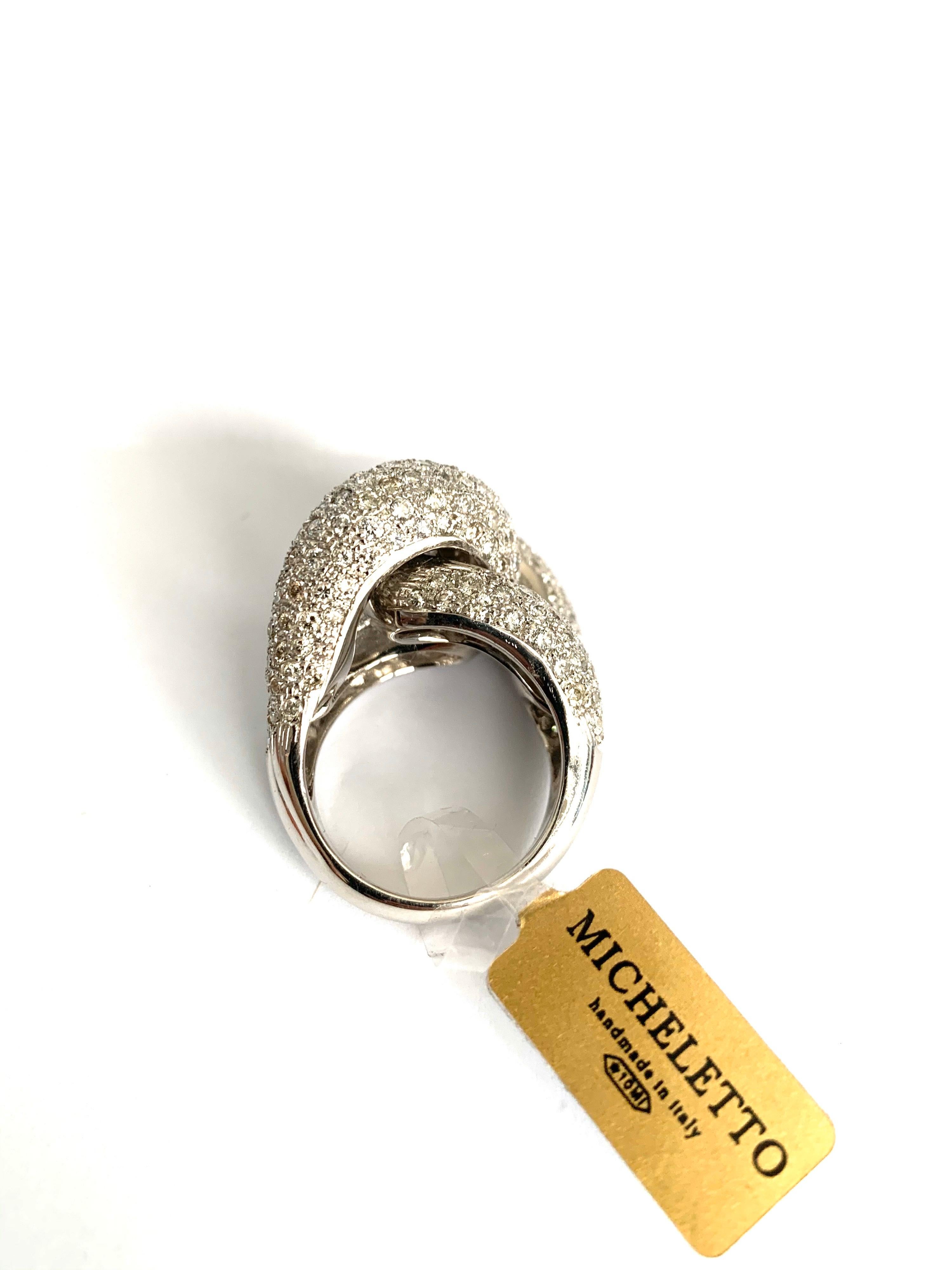 Mater groumette ring in 18 kt  white gold and white diamonds 
This iconic collection in Micheletto tradition find its masterpiece in this ring

the total weight of the gold is  gr 23.30
the total weight of the white diamonds is ct 5.23 - color GH