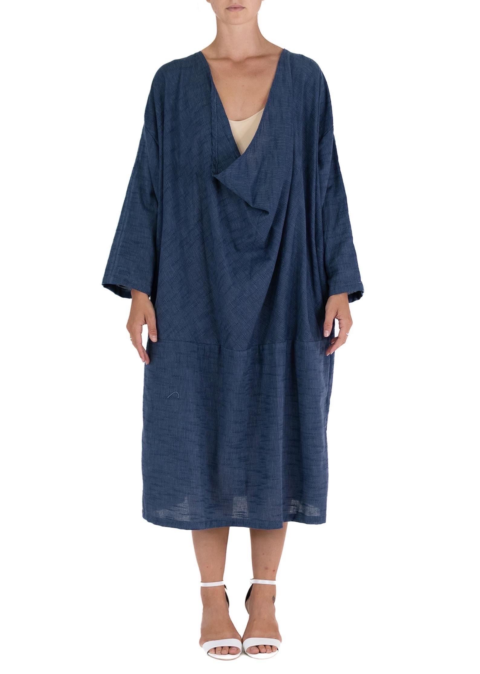 MASTER MORPHEW COLLECTION Indigo Blue Cotton Unisex Cowl Neck Tunic Kaftan
MORPHEW COLLECTION is made entirely by hand in our NYC Ateliér of rare antique materials sourced from around the globe. Our sustainable vintage materials represent over a