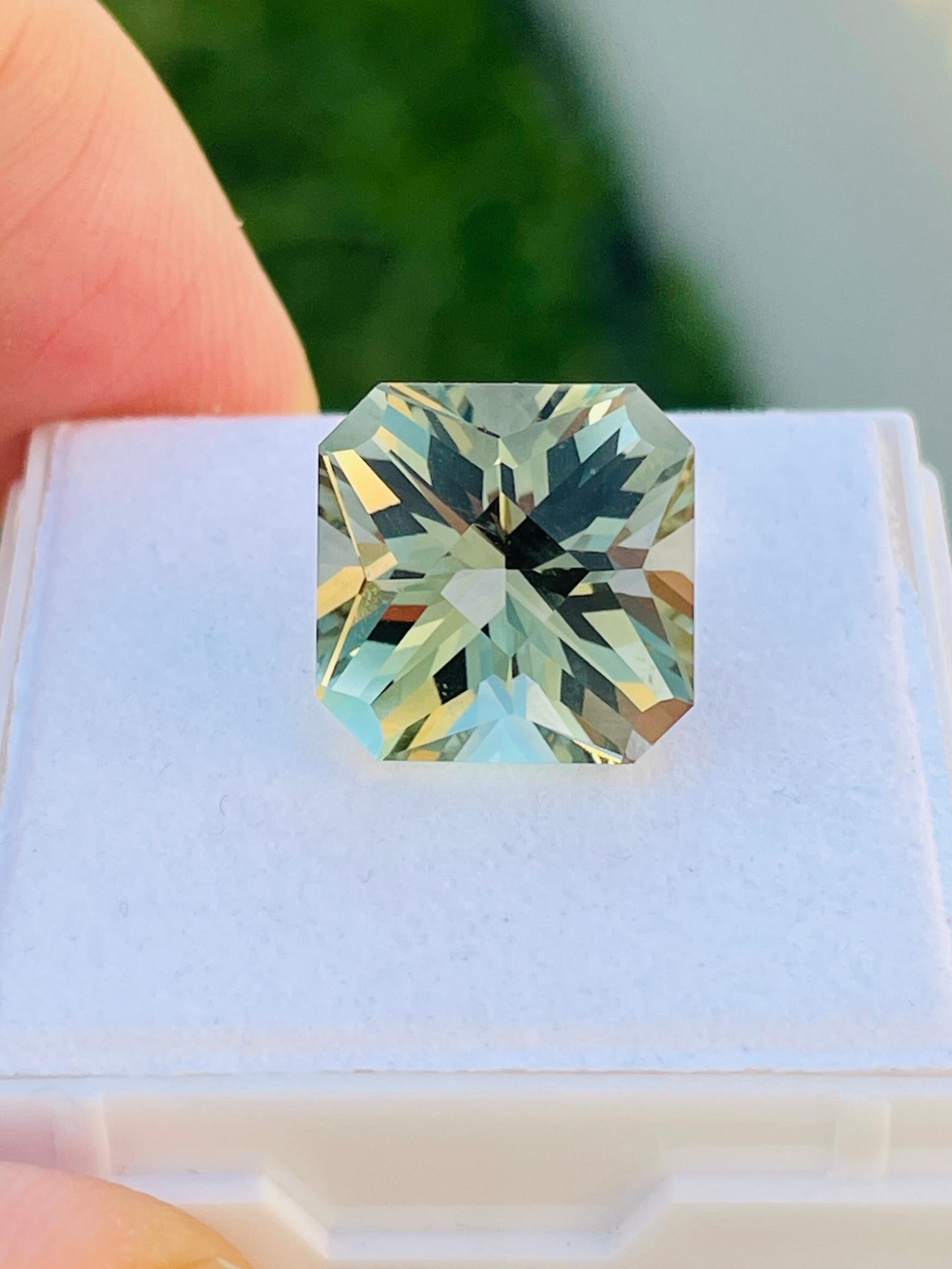 Name: green quartz or green amethyst 
weight: 9.48
size: 13mm
origin: Brazil 
color: green
clarity: loop clean 100%
Cut: WB GEM signature cut 

Precision cut and include design that only few professional master people can cut at world , this piece