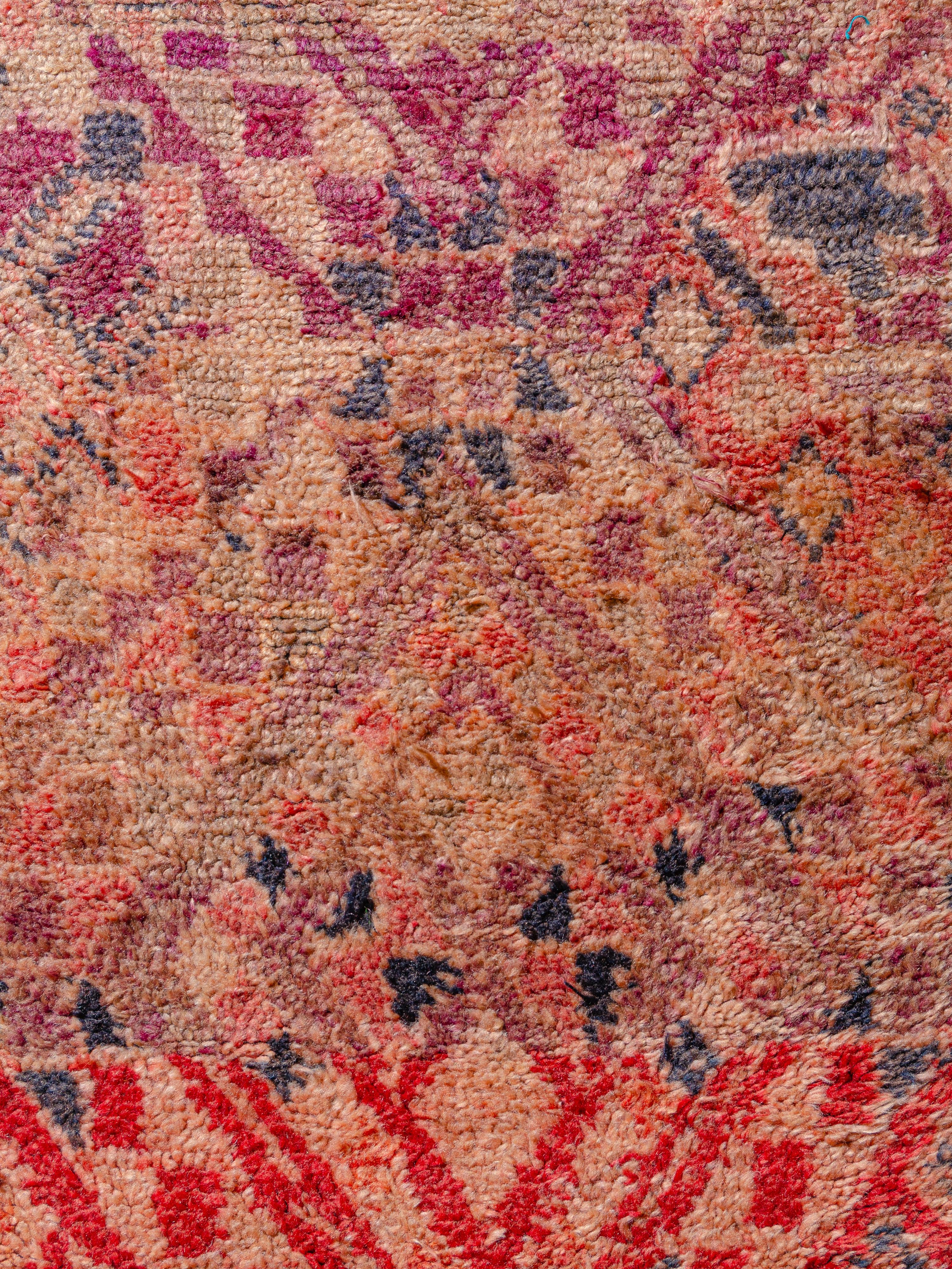 An exceptional vintage Moroccan Aït Youssi carpet, produced with the assistance of a master weaver, exhibiting organized bands of stories focused on lozenges as a theme. Multiple translations are executed in varying scales and color palettes,