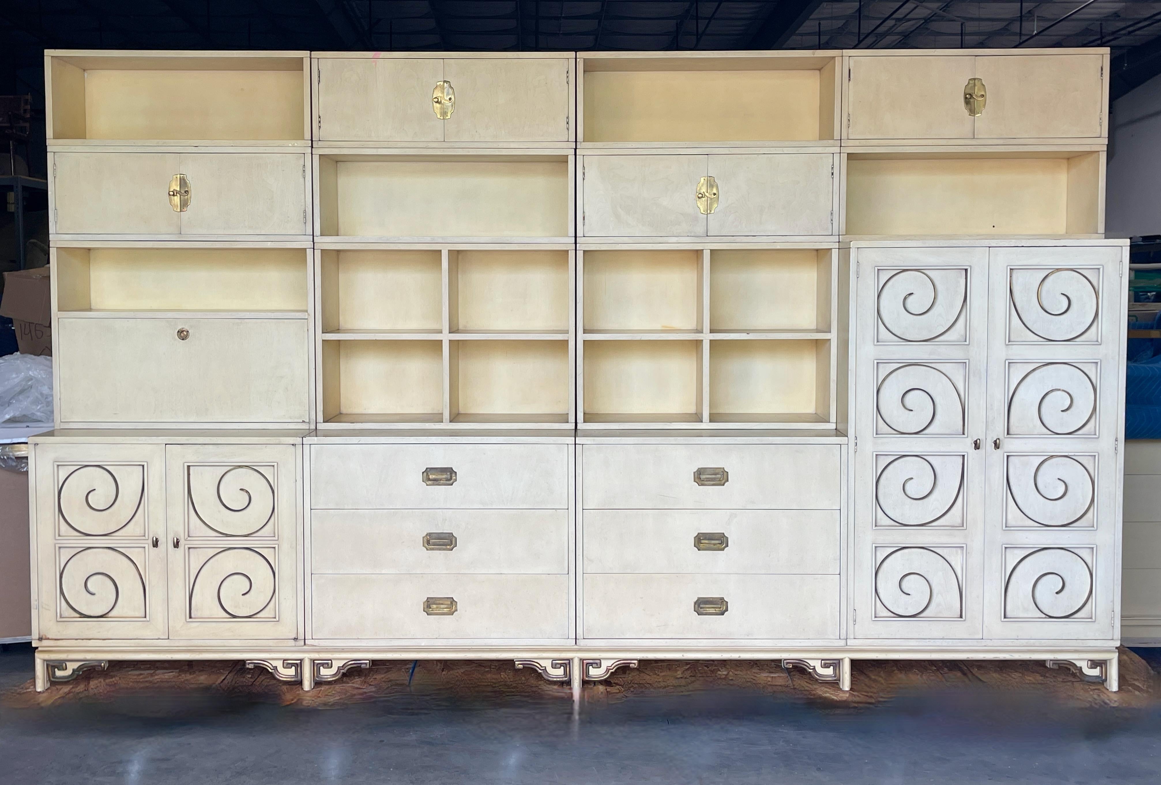 Very rare cabinet storage unit for living or bedroom by William Doezema for Mastercraft Originals from one of their earliest collections in the late 1950's. 
16 separate pieces: four chests set in one long stand topped with 11 individual