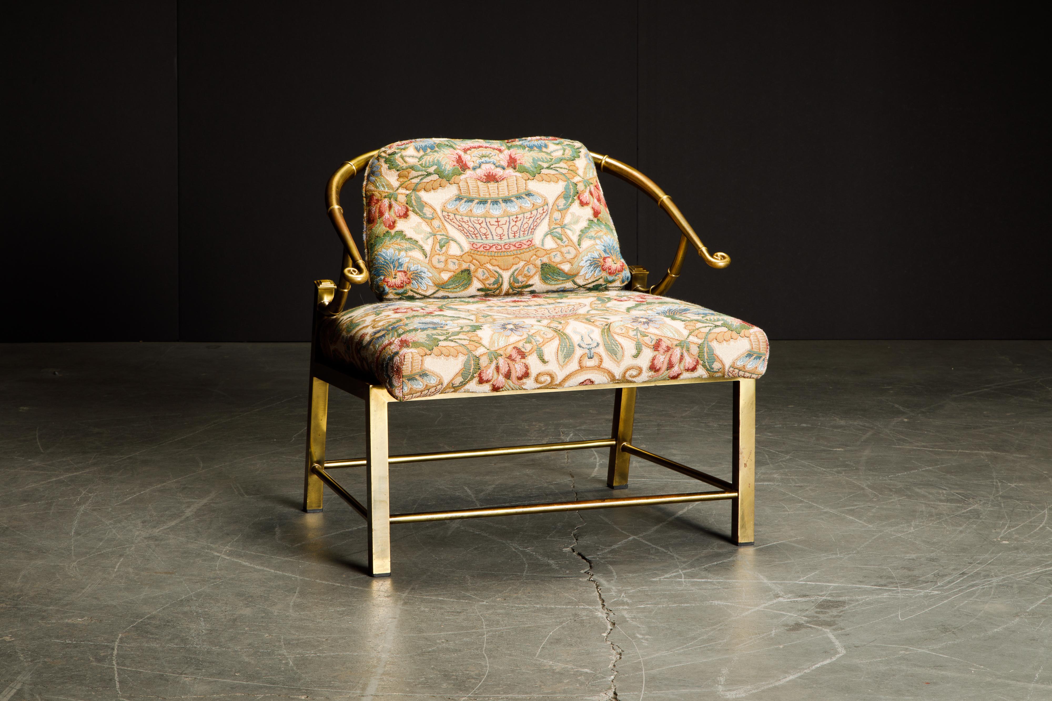 This beautiful lightly patinated brass slipper chair by Mastercraft is signed underneath with Made in Italy label. This gorgeous empress chair by Mastercraft shares design cues with James Mont with its asian influences, designed by Charles Pengally