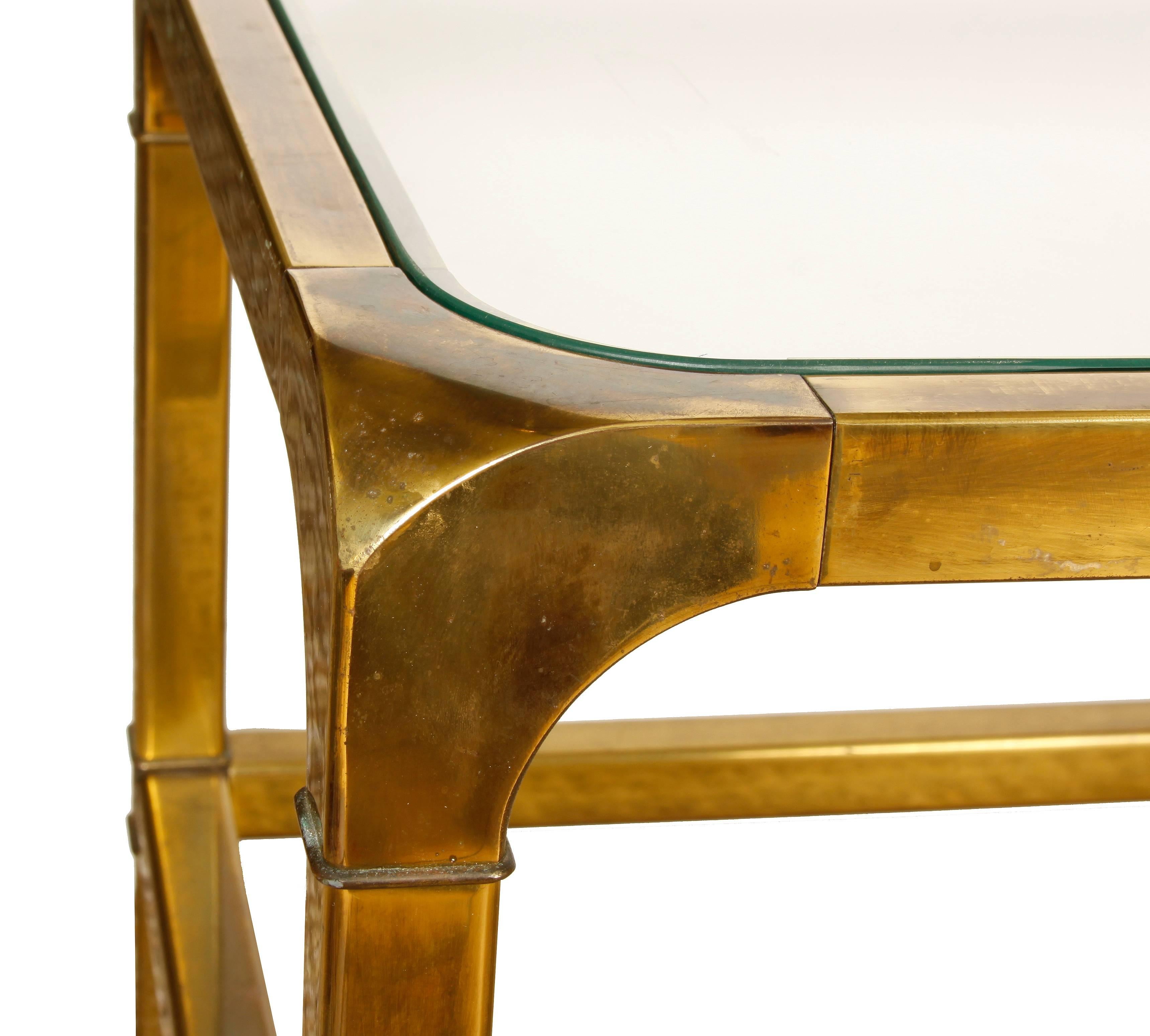 Mastercraft brass and glass cocktail table. Rectangular with rounded corners 