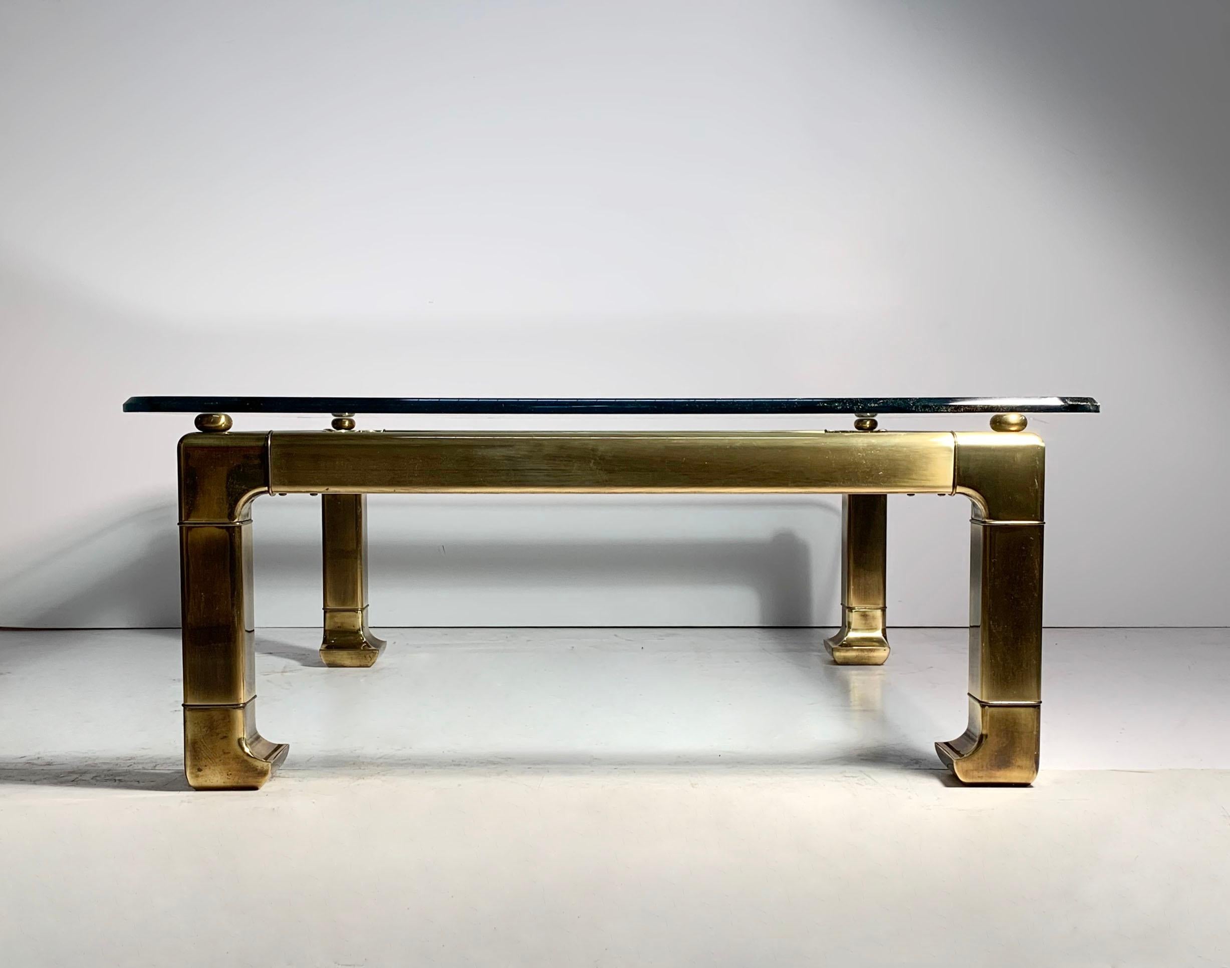 Hollywood Regency Mastercraft brass Chinoiserie glass coffee table. Style of James Mont.