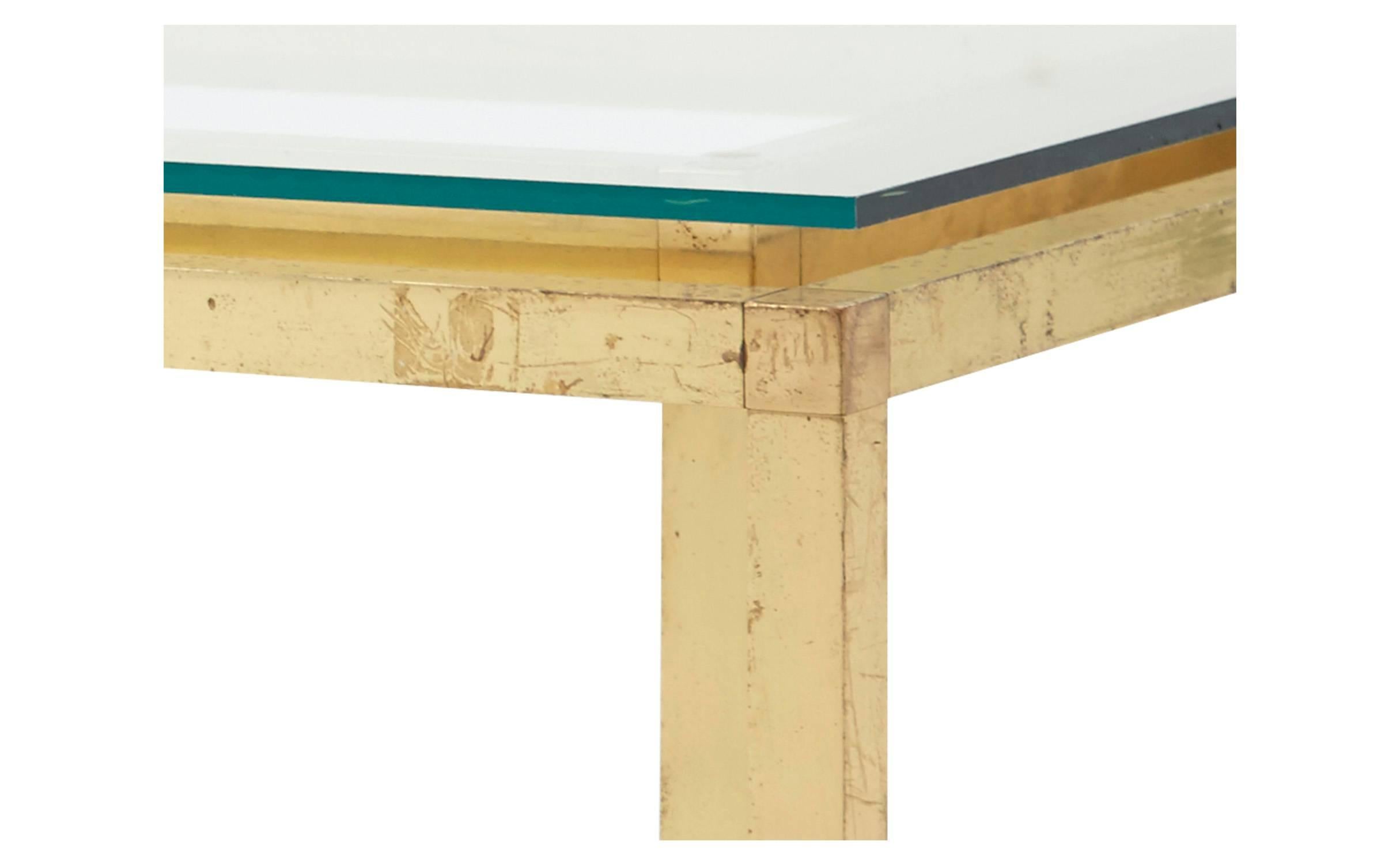 Founded in the late 1940s, Mastercraft Furniture brought sophisticated, European-inspired design to America throughout the mid-20th century. Found in France, our Vintage Brass Coffee Table pairs a rectangular glass top with an angular brass base.