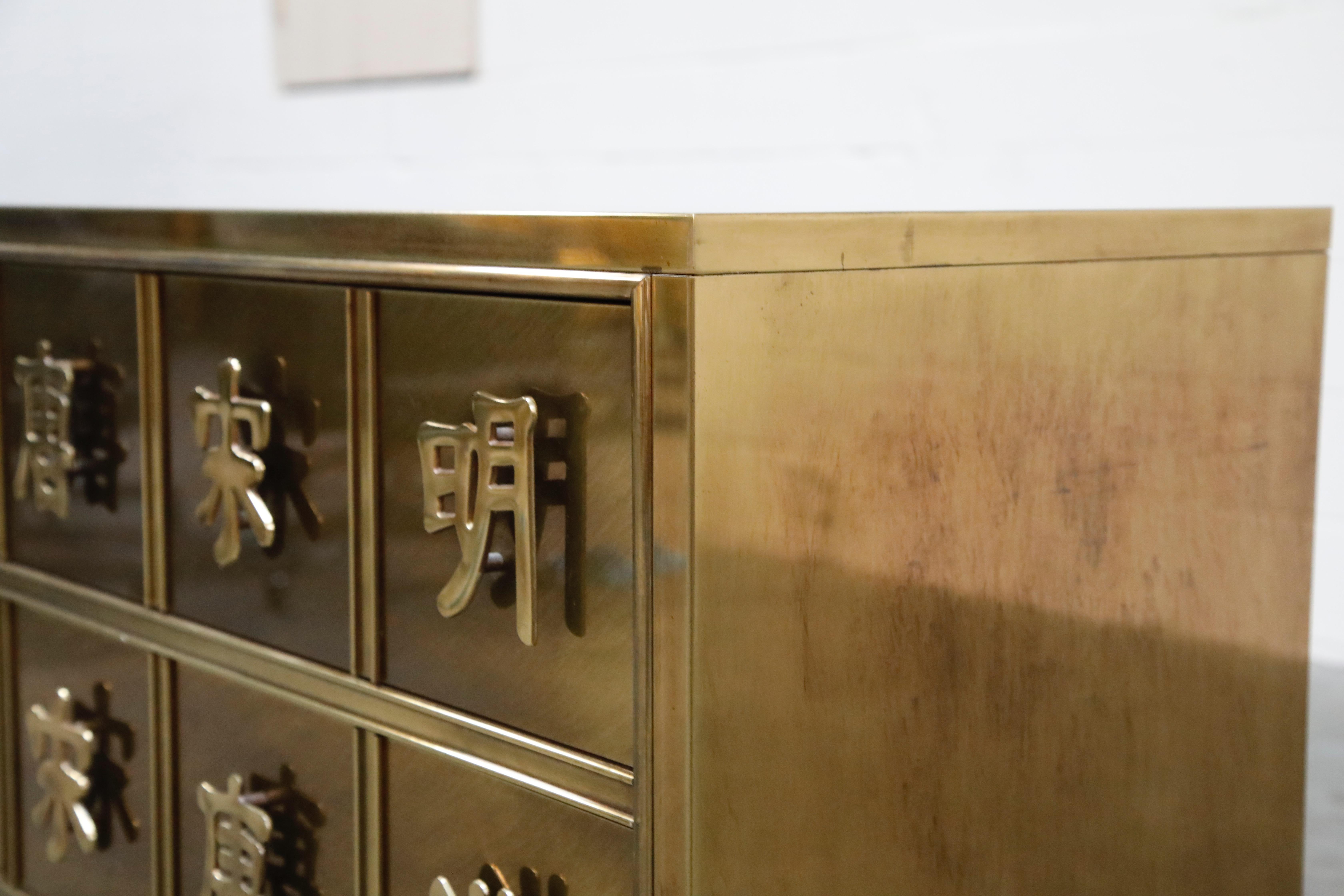 Late 20th Century Mastercraft Brass Commode Dresser with Chinese Character Brass Pulls, circa 1970