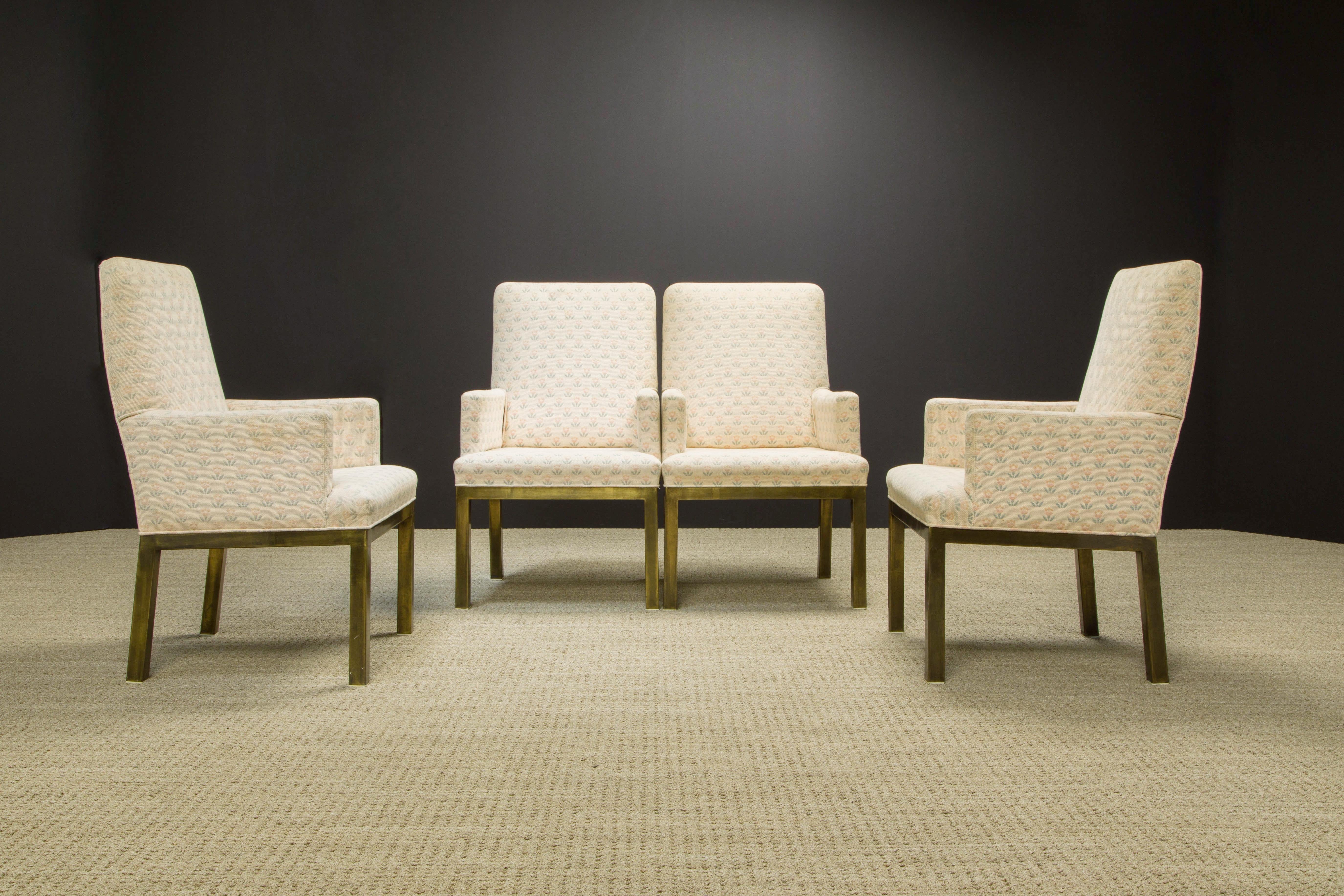 This super cute set of four (4) dining armchairs by Mastercraft feature a brass base with light patina and a very unique and interesting fabric that features light pink and baby blue flowers over an off-white knit. The fabric resembles what I would