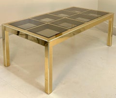 Mesa de comedor Mastercraft de latón con inserciones de cristal
