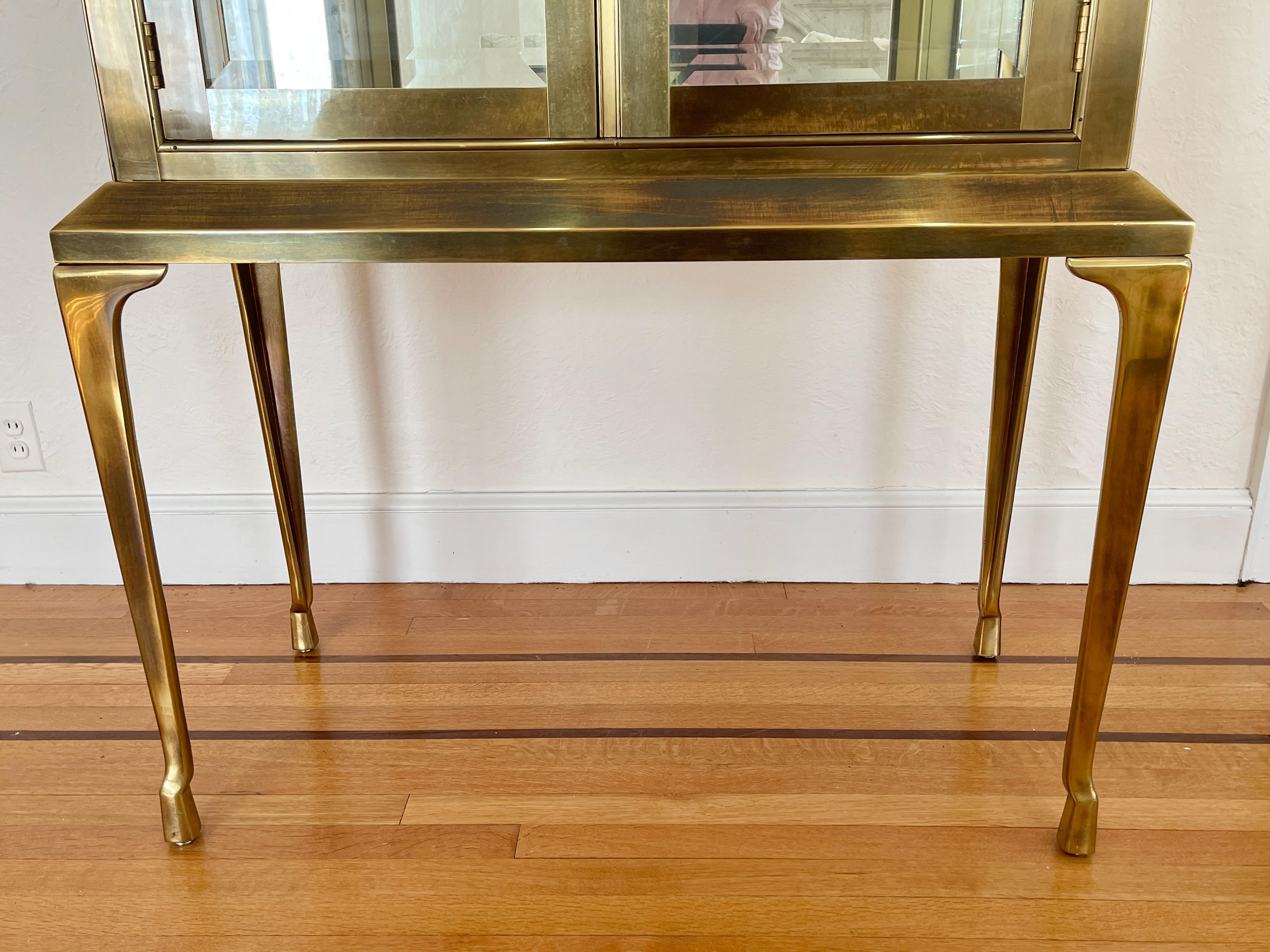 Late 20th Century Mastercraft Brass Display Cabinet Vitrine on Four Tall Brass Legs