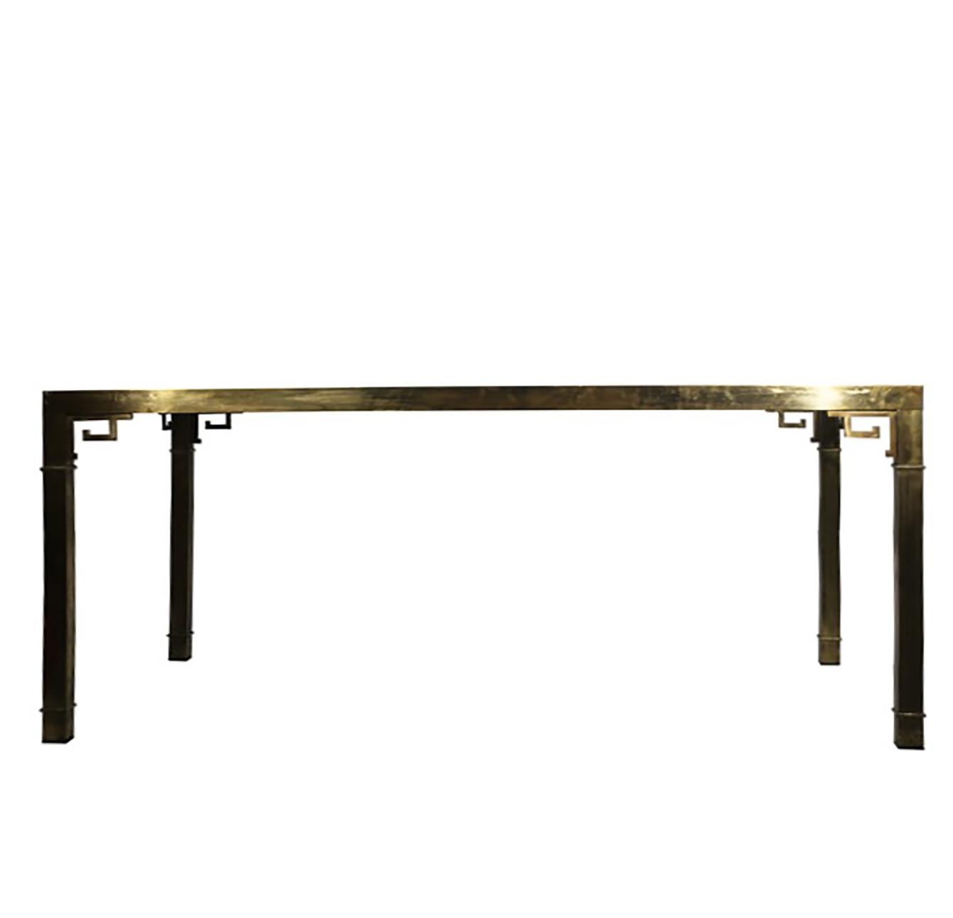 This Mastercraft brass and beveled glass dining table has a handsome Greek key design.
The Greek key motif is classic, modern and therefore timeless.
Brass has beautiful color and patina.
There is 27