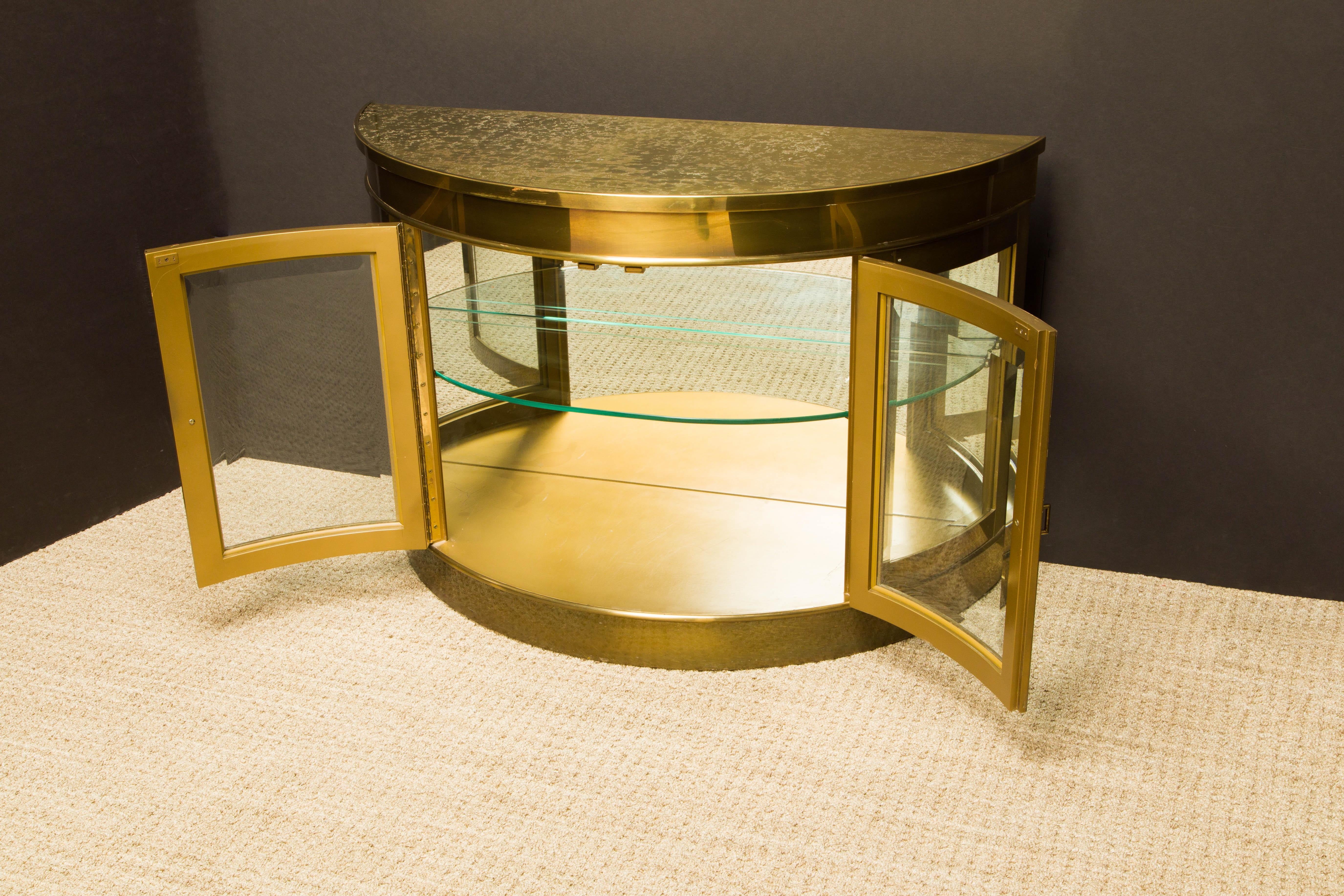 Late 20th Century Mastercraft Brass Illuminated Demilune Vitrine Cabinet, 1970s, Signed For Sale