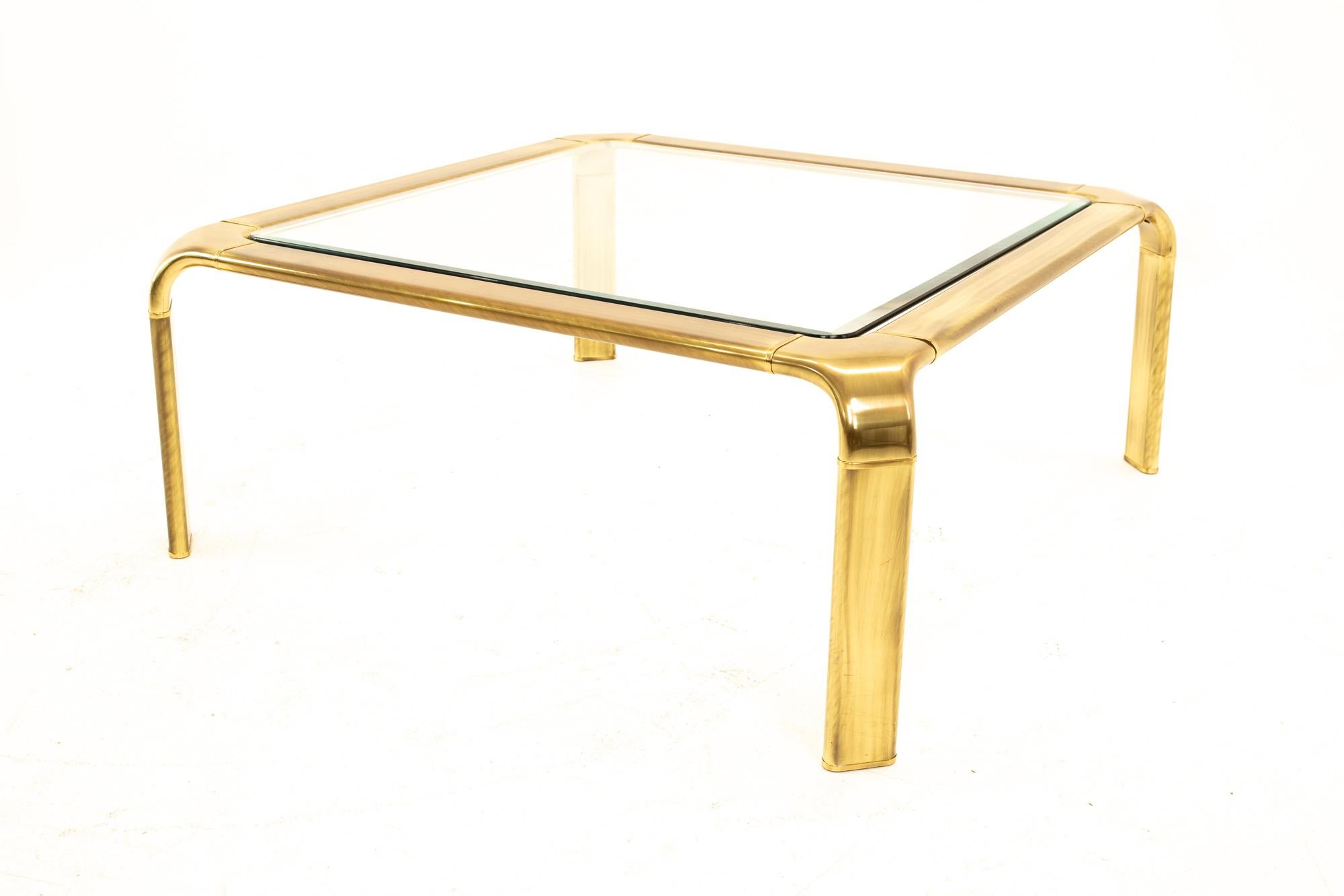 Mastercraft brass mid century coffee table
Table measures: 38 wide x 38 deep x 16 high

All pieces of furniture can be had in what we call restored vintage condition. That means the piece is restored upon purchase so it’s free of watermarks,