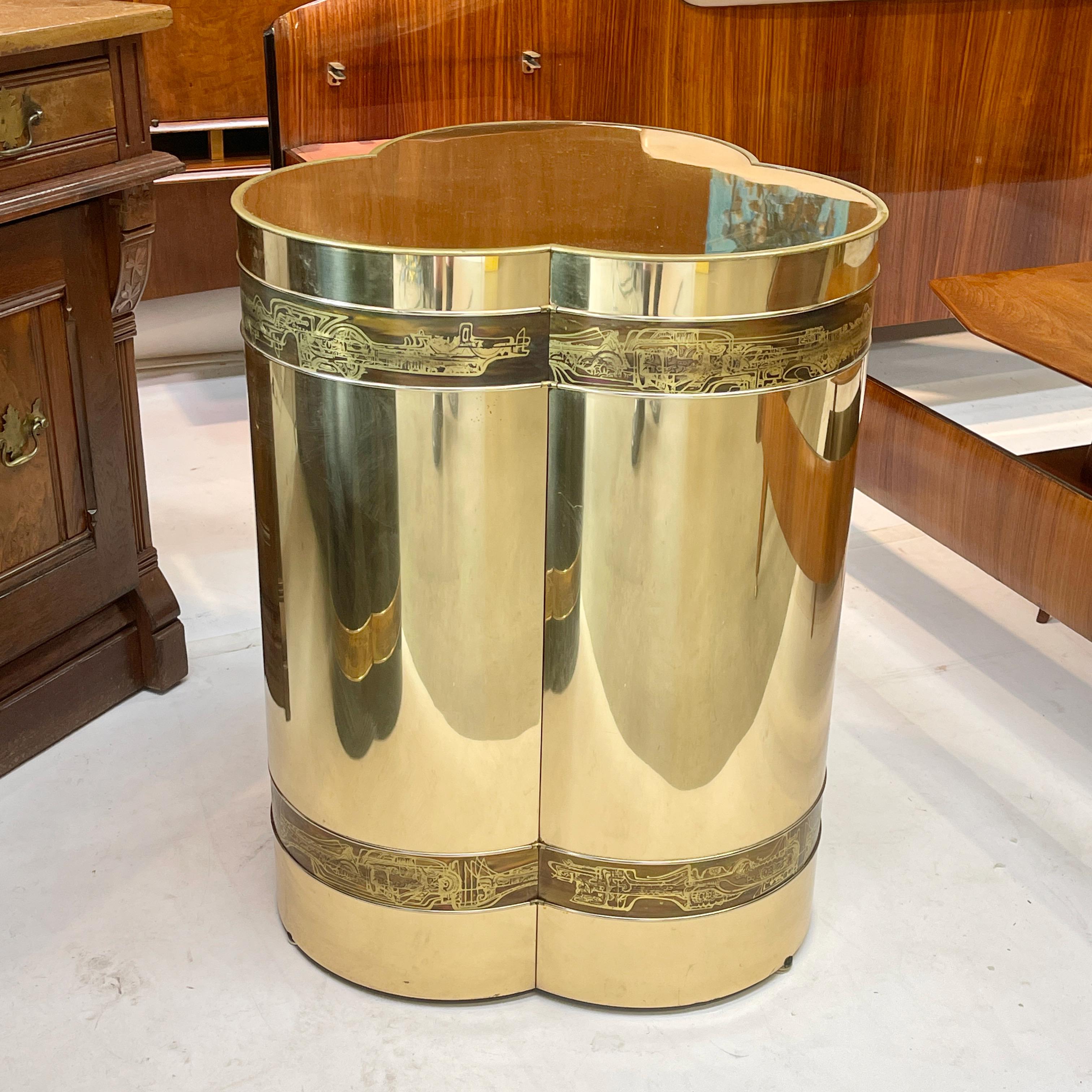 Mastercraft trifoliate form pedestal table base clad in mirror polished and clear lacquered brass sheet with art metal bands of acid etched brass by artist Bernhard Rohne. 
27.5 inches high by 21 inches diameter. 
Per the original Mastercraft