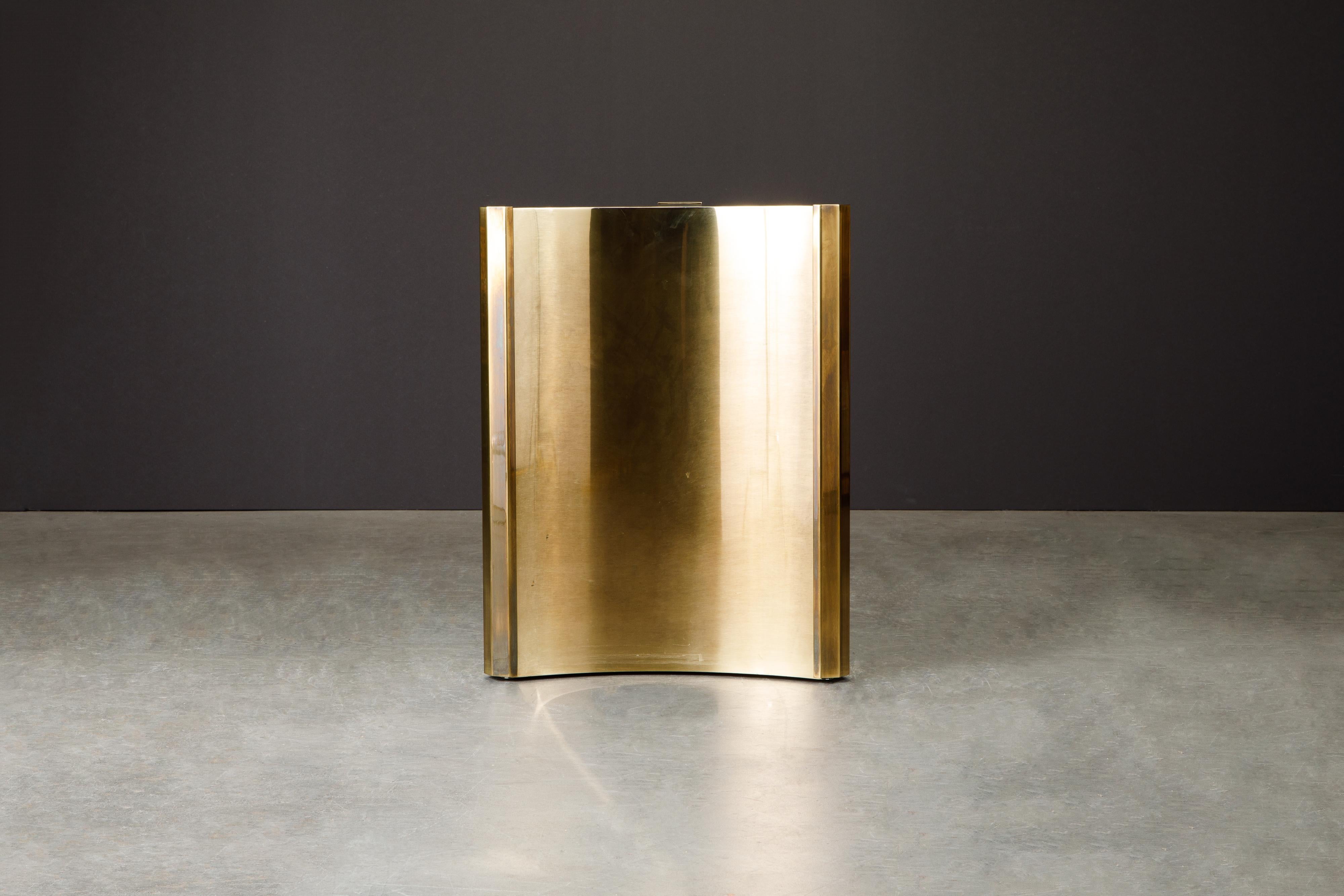 One of the hottest items currently with interior designers are these gleaming brass 'Trilobi' Mastercraft dining table base, which also work excellent for a desk, feature a hefty triangular design with sculpted ends. The gorgeous brass displays