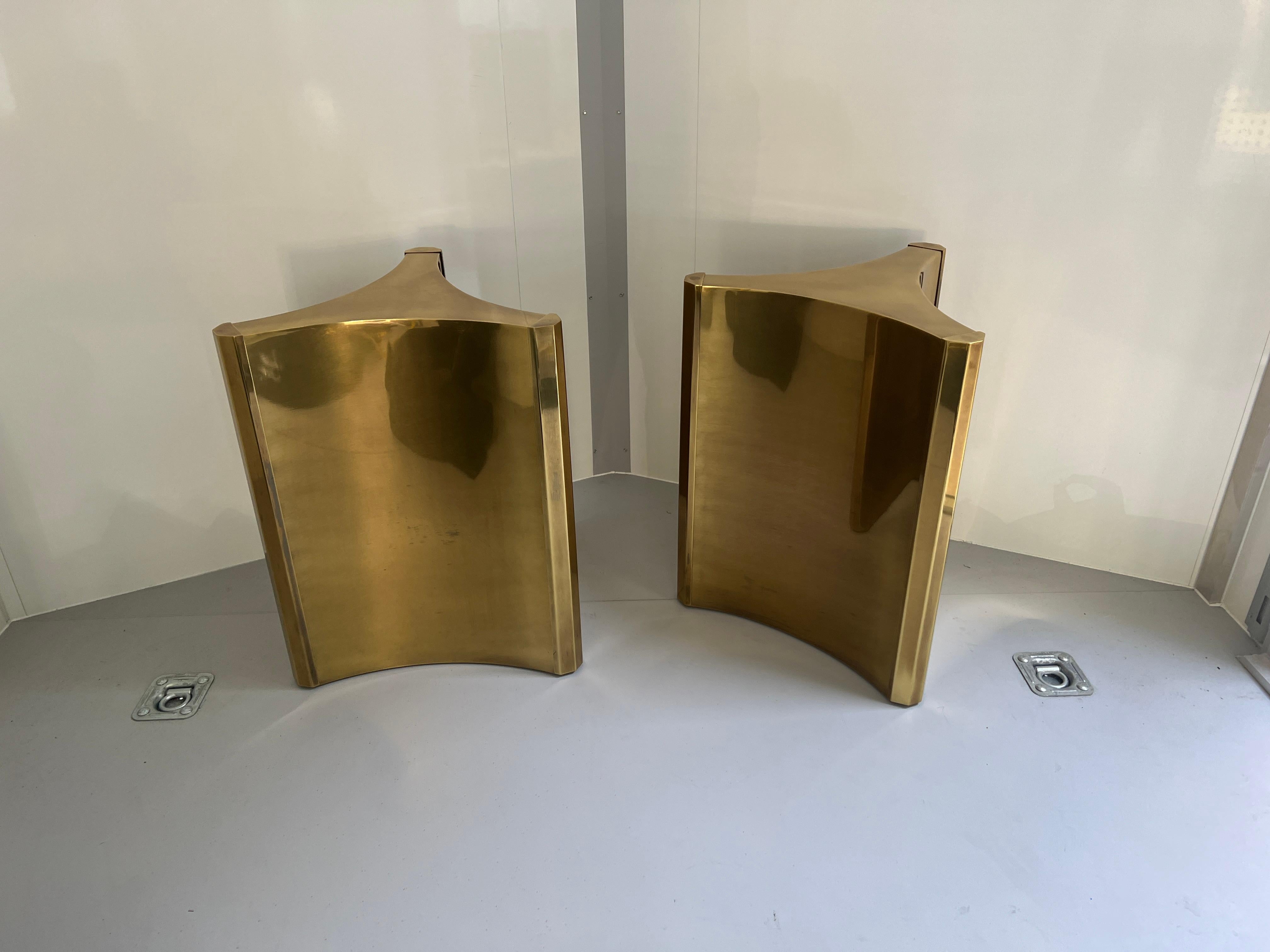 One of the hottest items currently with interior designers are these gleaming brass 'Trilobi' Mastercraft dining table bases, which also work excellent for a desk or work table, feature a hefty triangular design with sculpted ends. The gorgeous