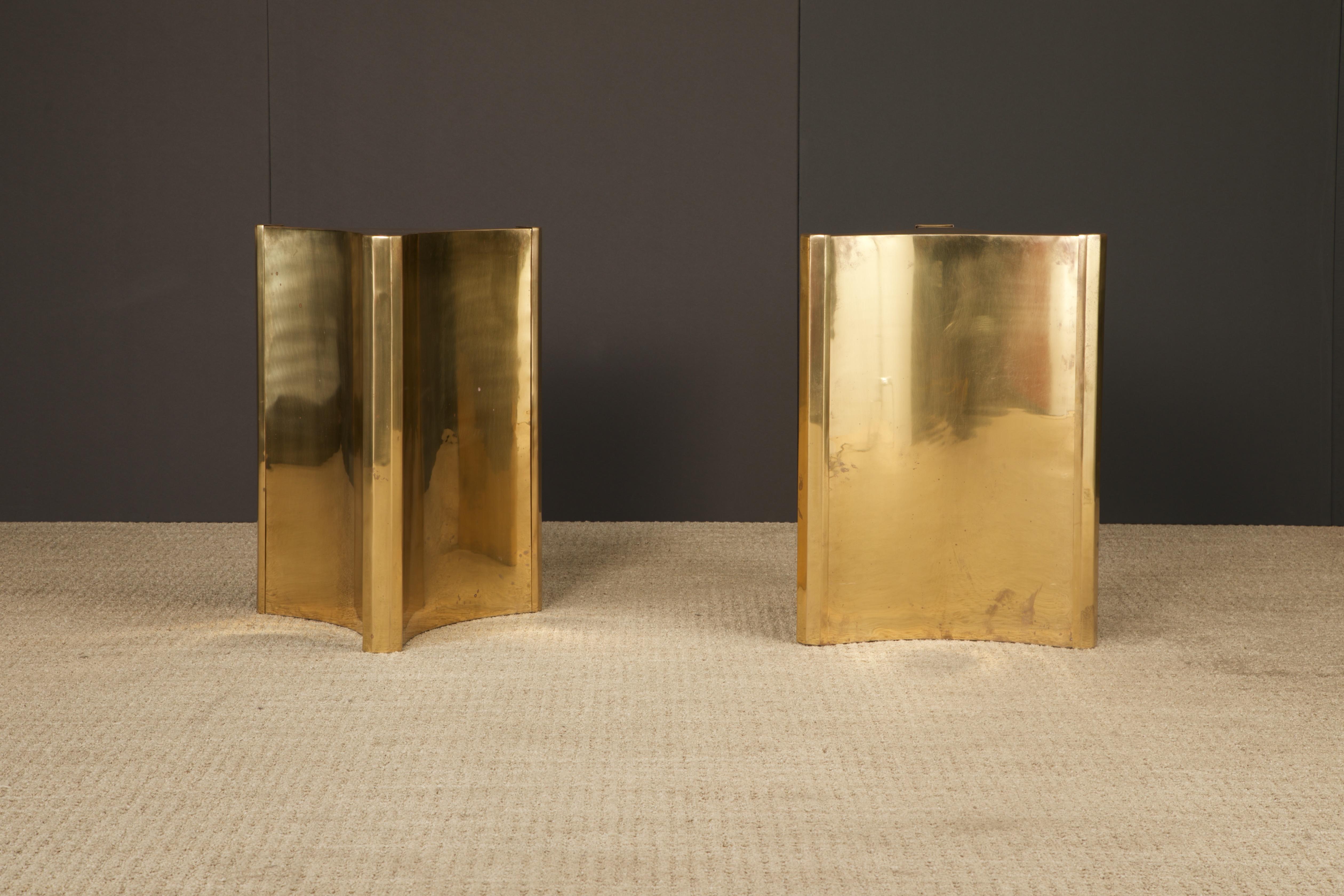One of the hottest items currently with interior designers are these gleaming brass 'Trilobi' Mastercraft dining table bases, which also work excellent for a desk or work table, feature a hefty triangular design with sculpted ends. 

*Please note,