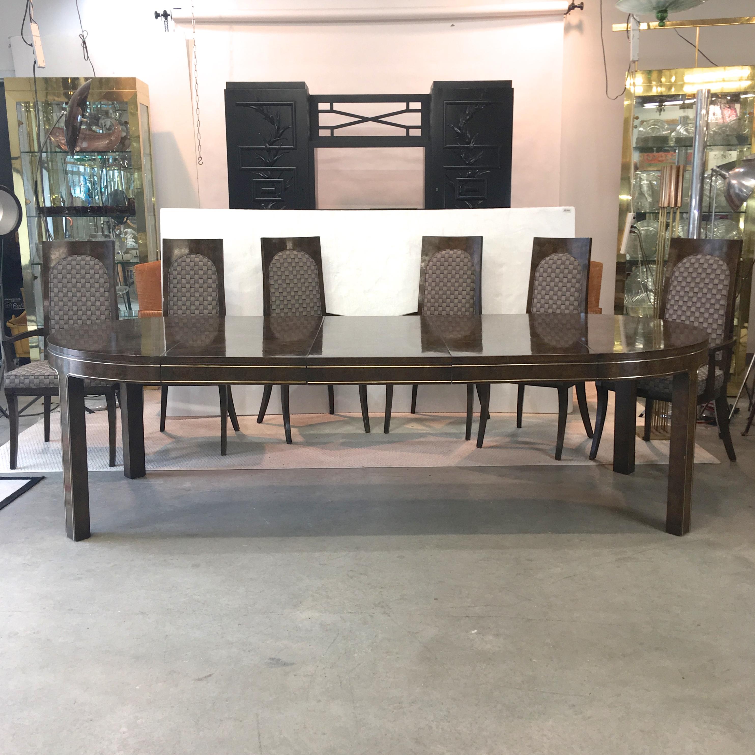 HOLIDAY SALE


Vintage 1960s dining table and six chairs designed by William Doezema for Mastercraft retailed by Charak of Boston. Briar root burl veneer although frequently identified as Amboyna. Brass trim all along apron up and around legs. Table