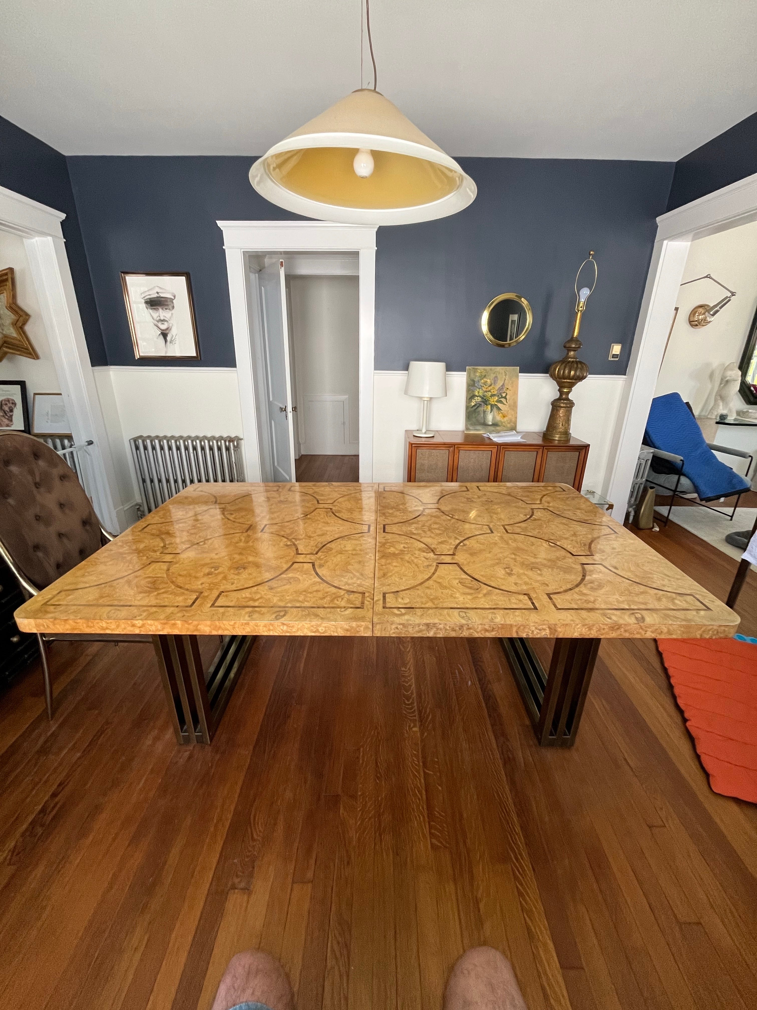Stunning Mastercraft Dining Table. Burled Ash with Walnut or Rosewood inlay. Channeled brass sled legs. 2 leaves at 18