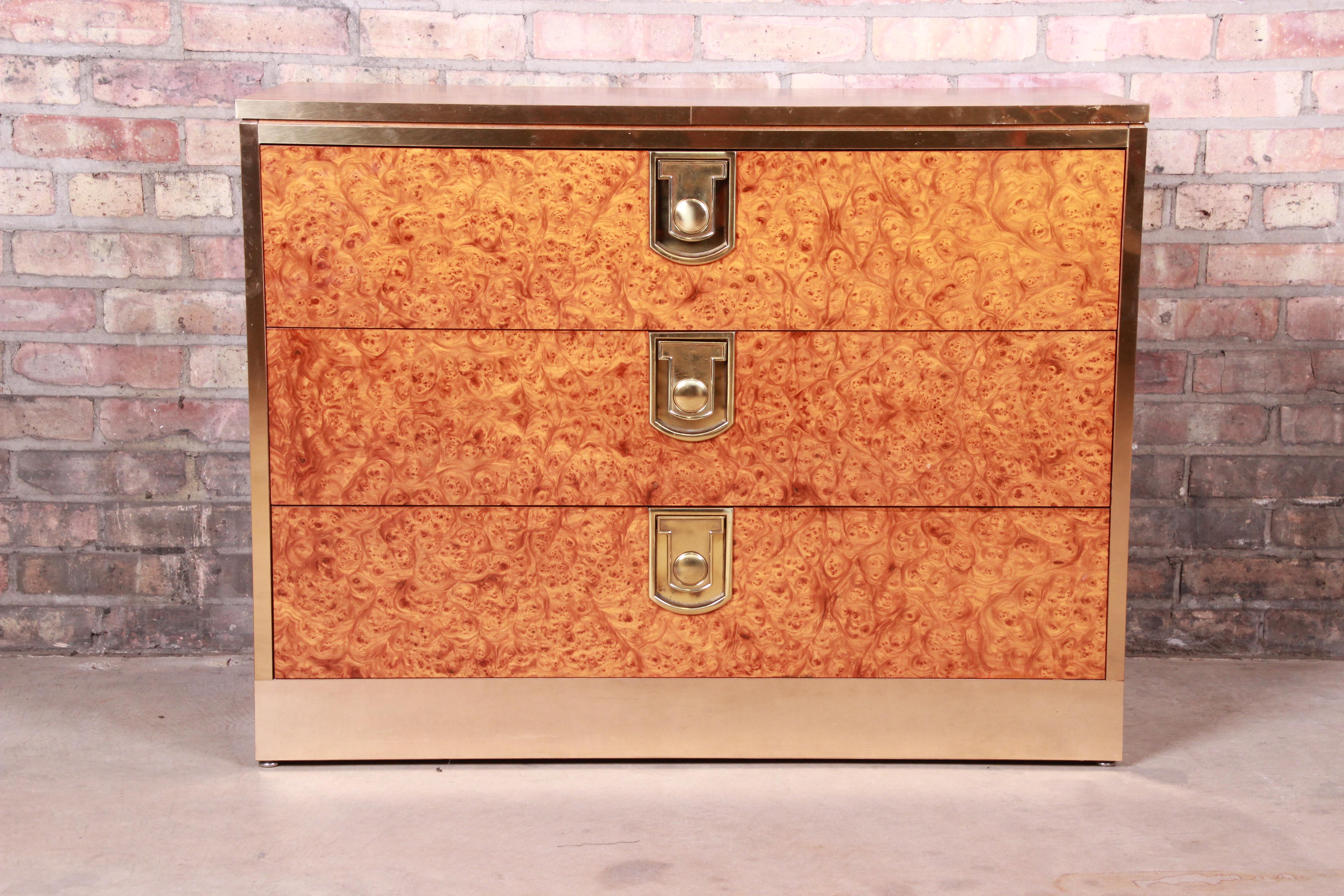 An exceptional Mid-Century Modern Hollywood Regency three-drawer bachelor chest dresser

By Mastercraft Furniture

USA, circa 1970s

Olive ash burl and rosewood, with brass hardware and trim.

Measures: 38.13