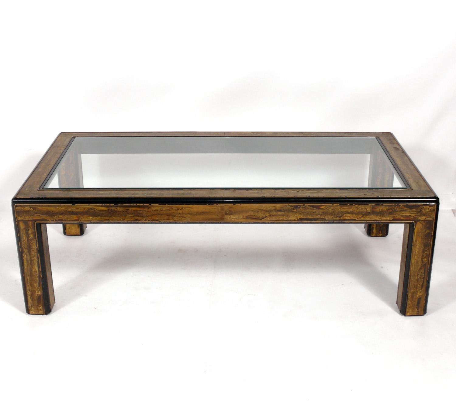 Elegant Etched brass large scale coffee table, designed by Bernhard Rohne for Mastercraft, American, circa 1960s. This table measures an impressive 55