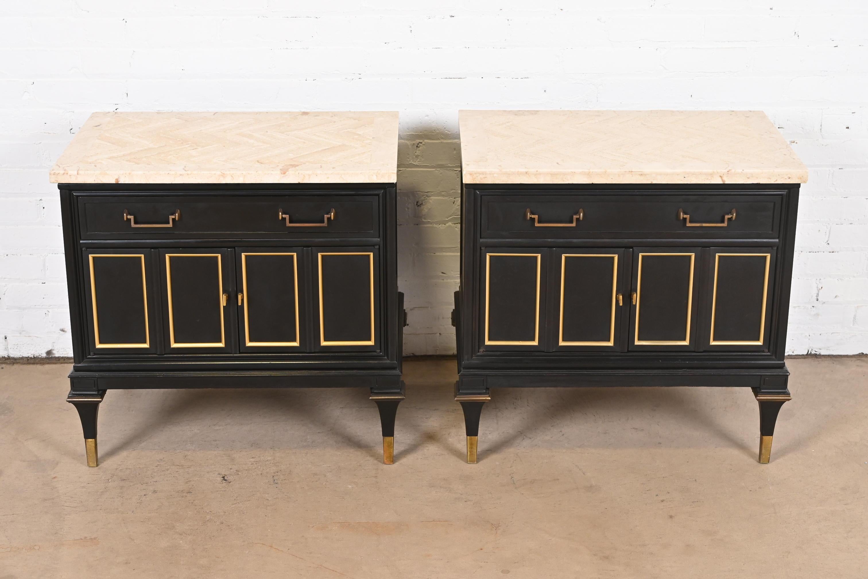 A gorgeous pair of mid-century modern Hollywood Regency bedside chests or end tables

By Mastercraft Furniture

USA, Circa 1960s

Black lacquered walnut, with brass trim and original brass hardware, and Italian travertine tops.

Measures: 26.88