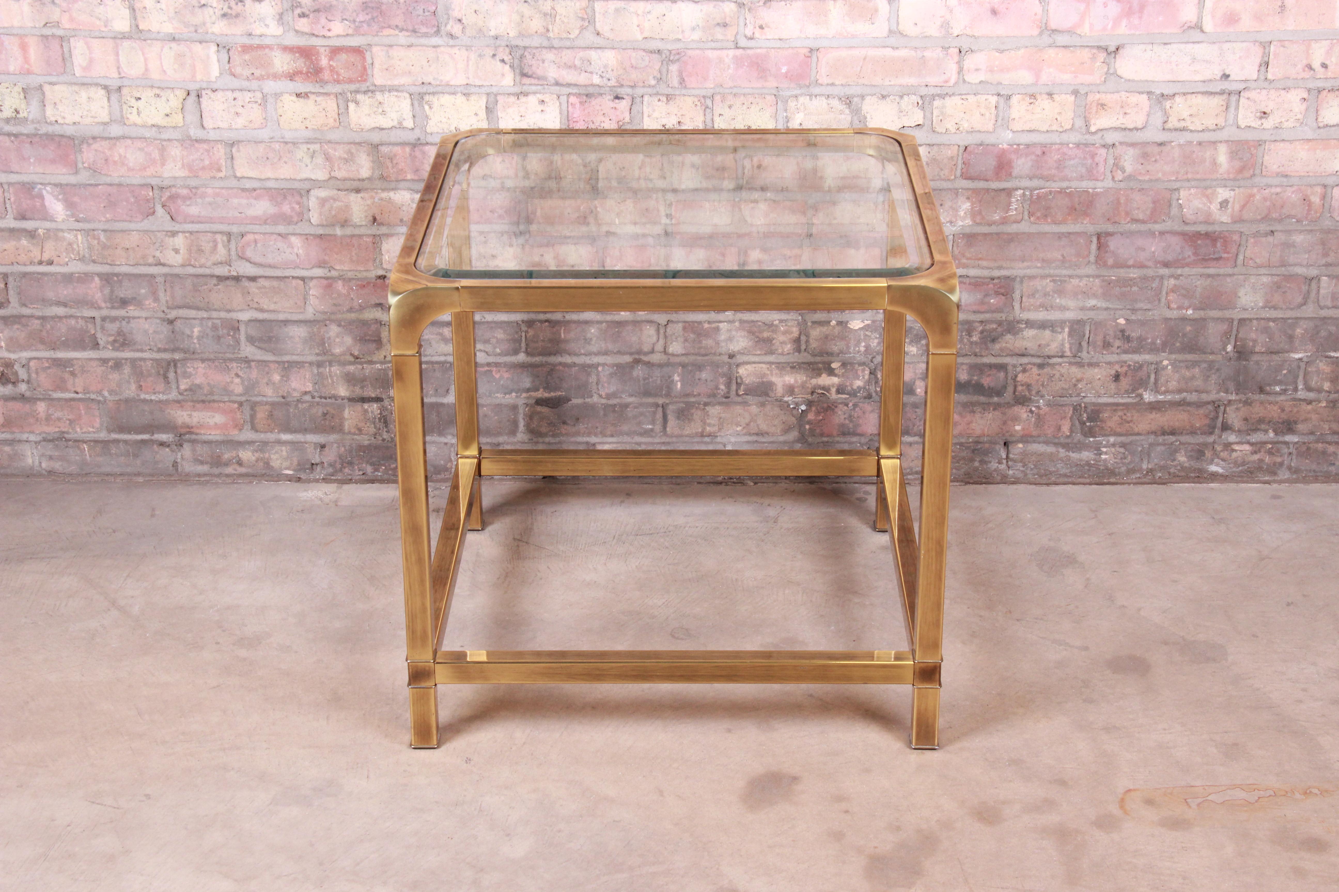 A gorgeous midcentury Hollywood Regency side table

By Mastercraft Furniture

USA, circa 1970s

Brass frame with beveled glass top.

Measures: 25.75