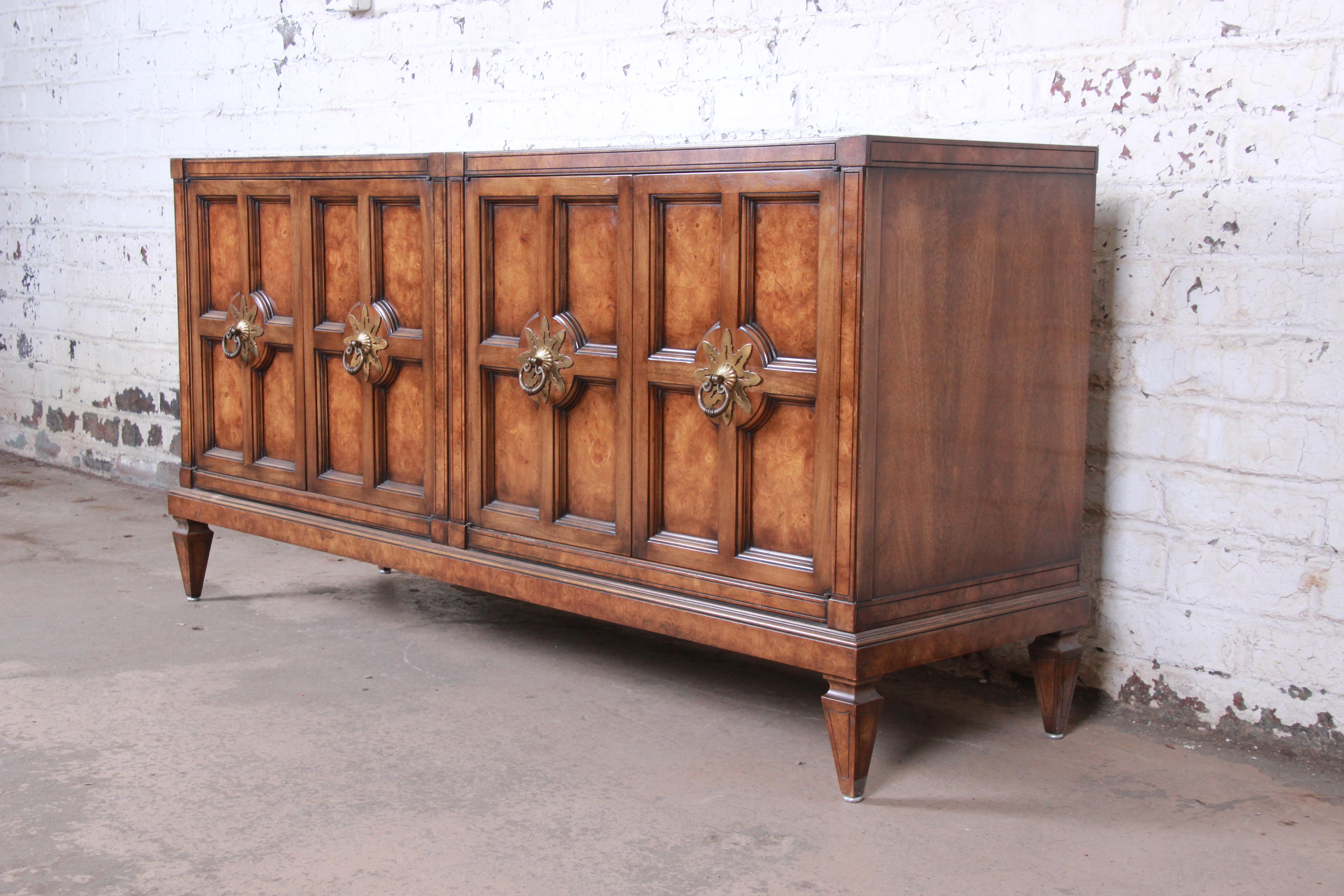 A gorgeous Mid-Century Modern Hollywood Regency sideboard credenza or bar cabinet

By Mastercraft Furniture

USA, 1960s

Amboyna burl + walnut + brass

Measures: 67.25