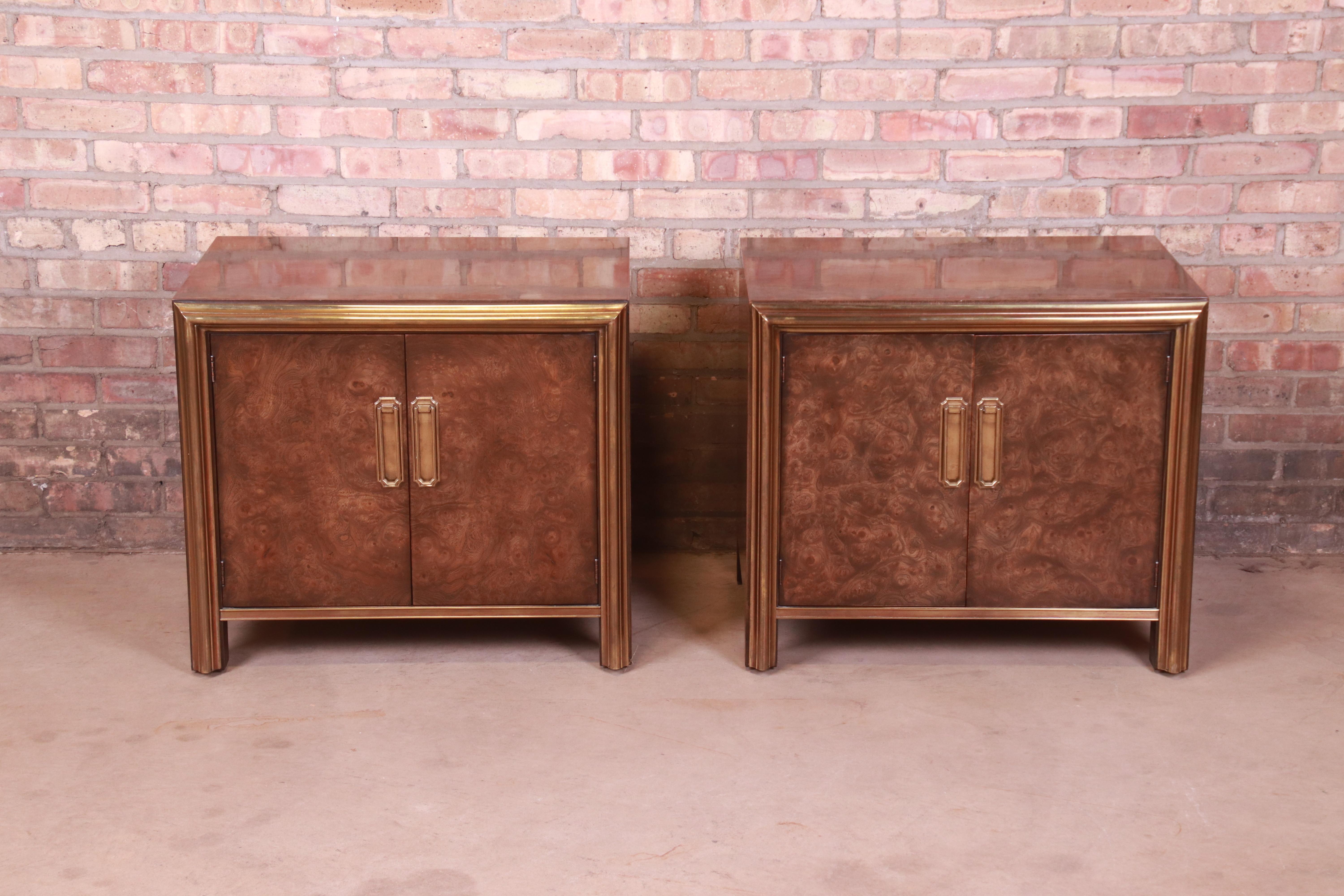 A gorgeous pair of Mid-Century Modern Hollywood Regency bedside chests

By Mastercraft Furniture

USA, 1970s

Burled Carpathian elm wood, with brass trim and original brass hardware.

Measures: 28