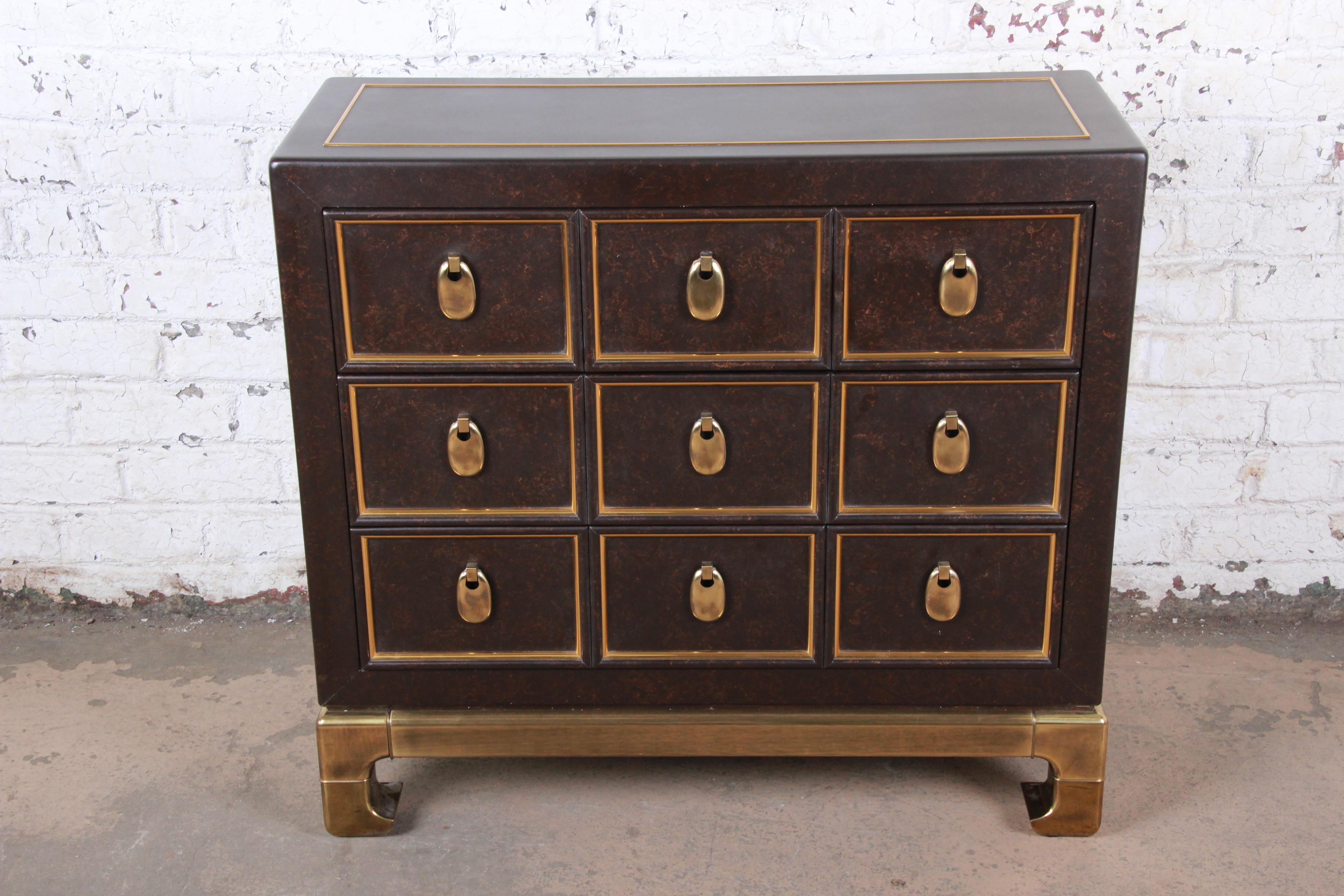 A rare and exceptional Mid-Century Modern Hollywood Regency chinoiserie three-drawer bachelor chest or commode

By Mastercraft Furniture

USA, circa 1970s

Asian-inspired brass legs, with brass trim and hardware and faux tortoiseshell