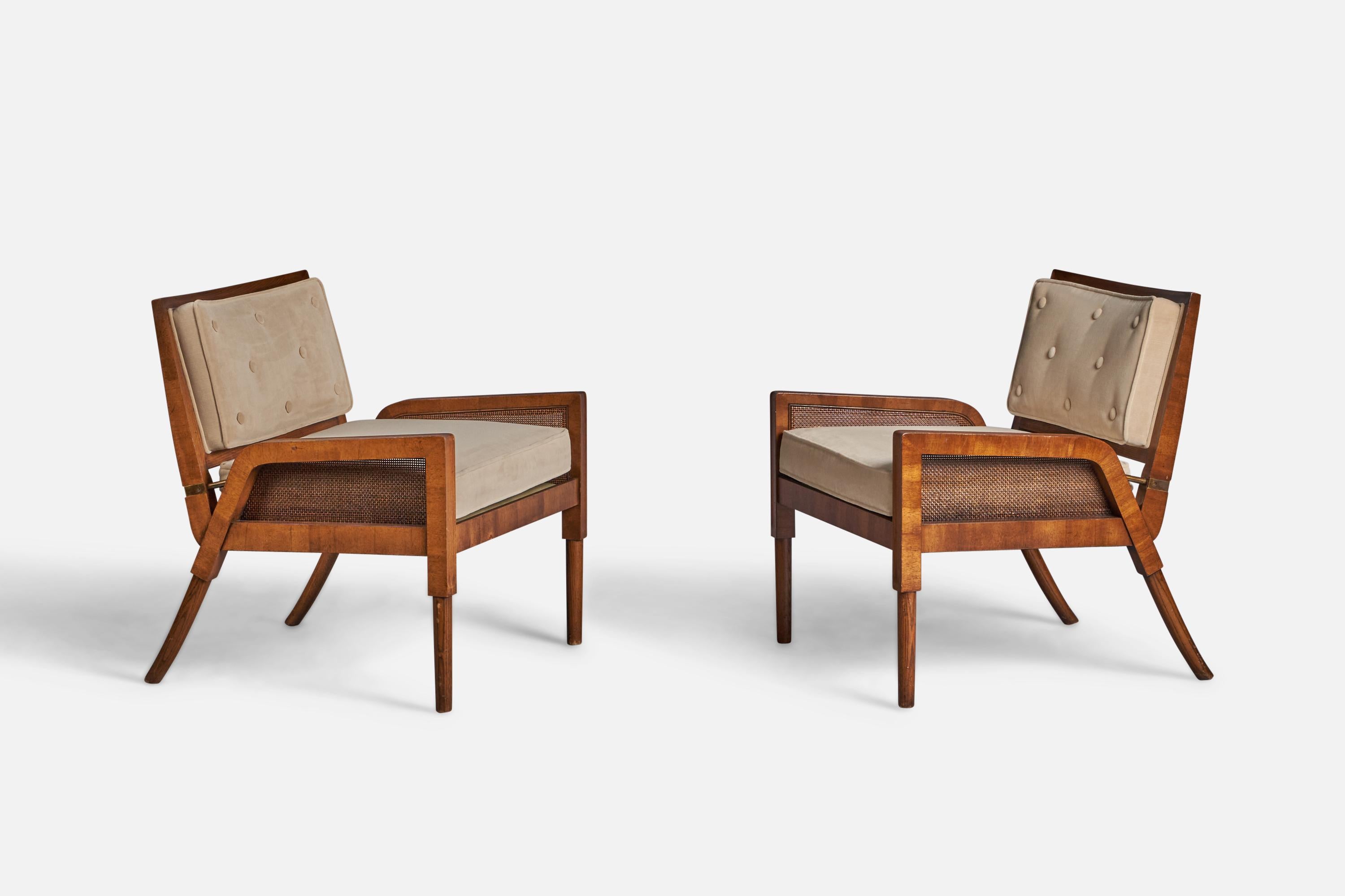 A pair of burl wood, beige fabric and cane lounge chairs designed and produced by Mastercraft, USA, c. 1950s.

17” seat height