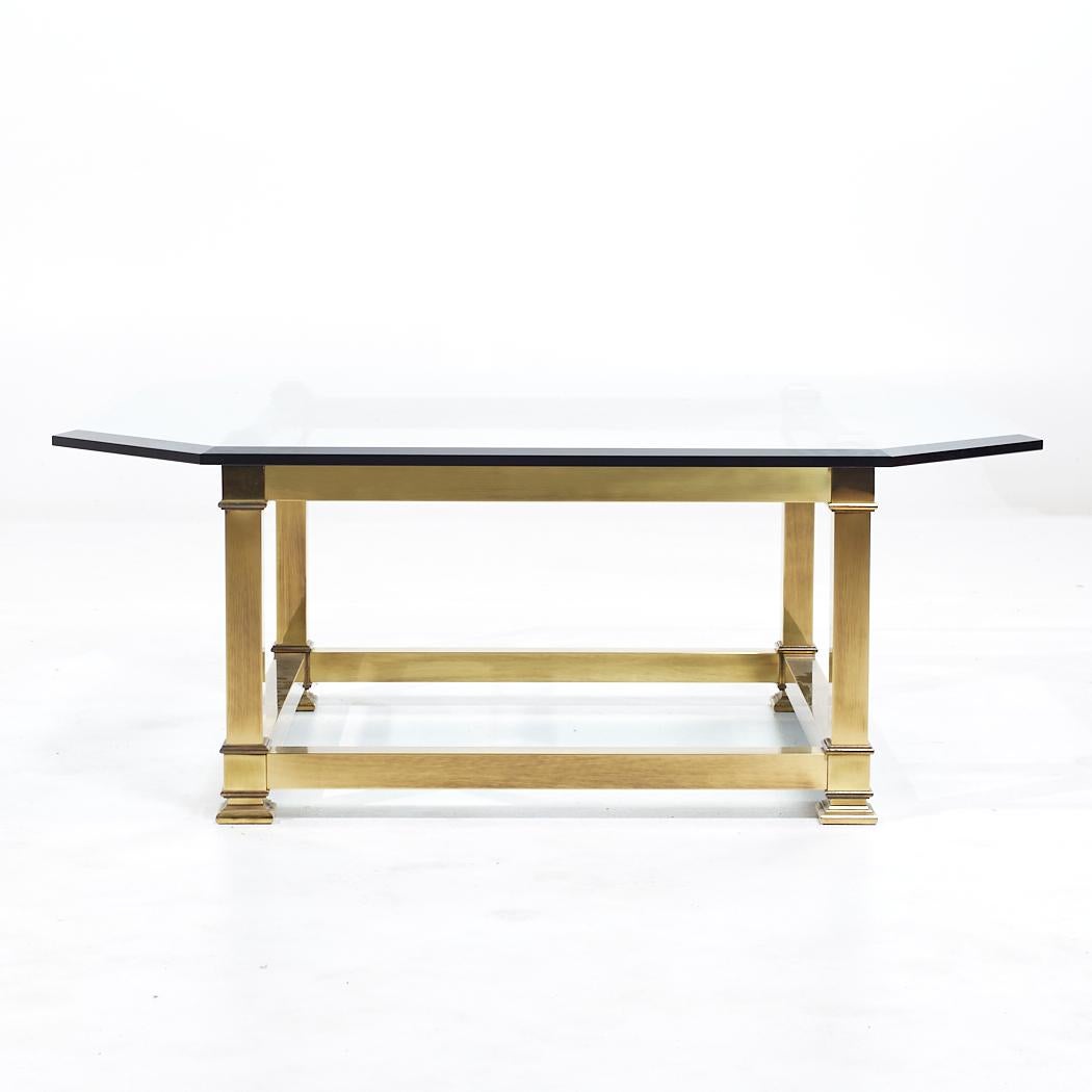 Mastercraft Mid Century Brass and Glass Coffee Table

This coffee table measures: 39.75 wide x 39.75 deep x 16 inches high

All pieces of furniture can be had in what we call restored vintage condition. That means the piece is restored upon purchase