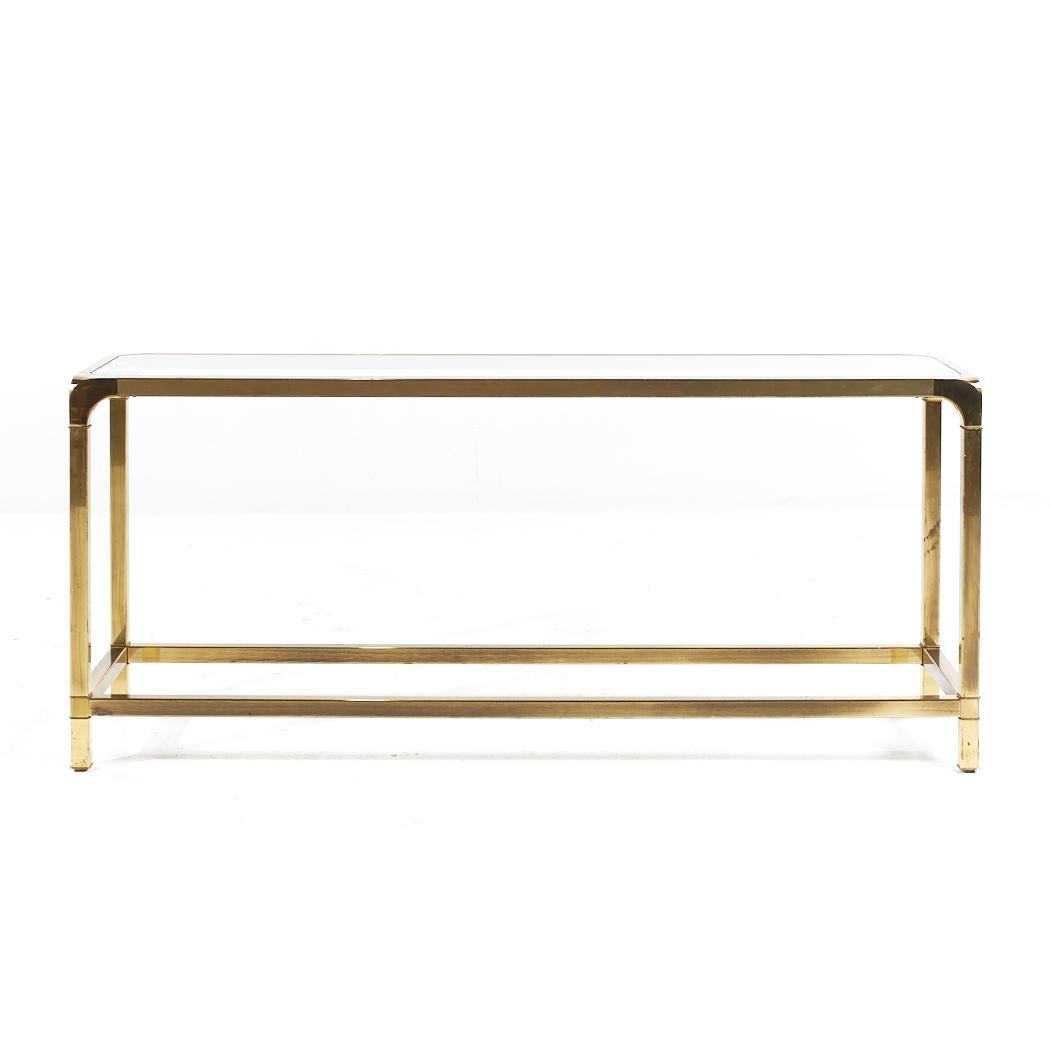 Mastercraft Mid Century Brass Console Table

This console table measures: 60 wide x 16 deep x 26 inches high

All pieces of furniture can be had in what we call restored vintage condition. That means the piece is restored upon purchase so it’s free