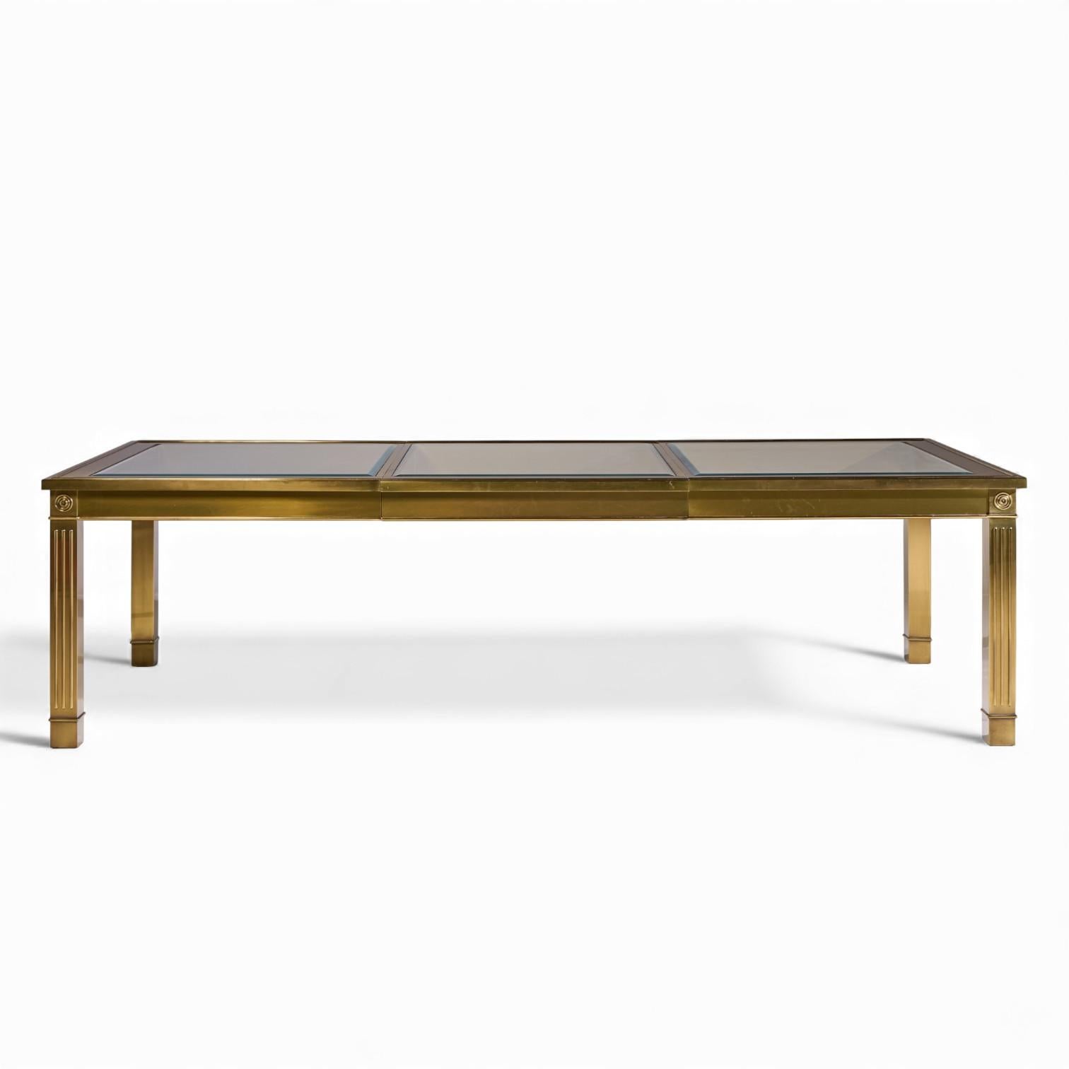 Mastercraft Mid Century Brass Expanding Dining Table with 1 Leaf

This table measures: 74.25 wide x 46 deep x 30 inches high, with a chair clearance of 25.25 inches, the leaf measures 33.75 inches wide, making a maximum table width of 108 inches