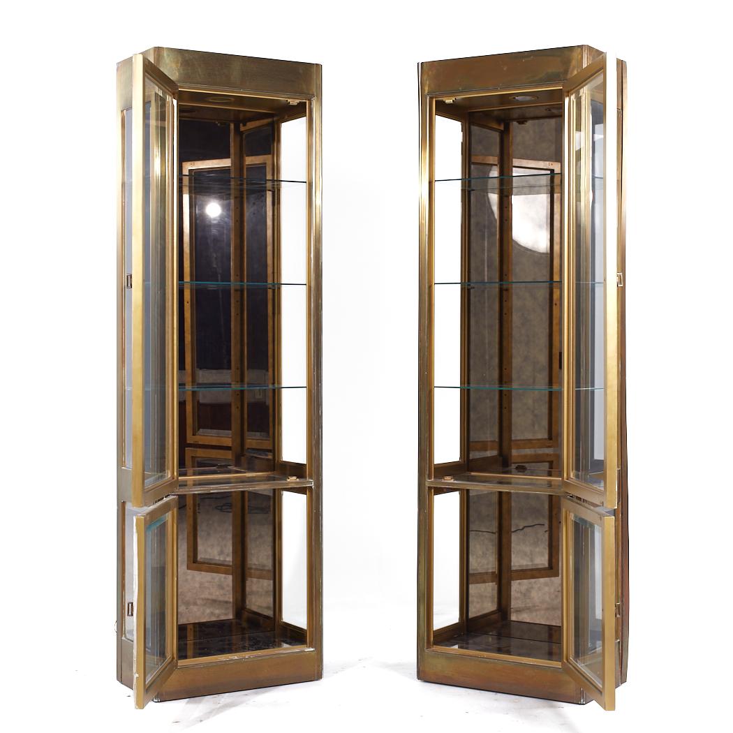 Mastercraft Mid Century Brass Vitrine Display Cabinets - Pair

Each display cabinet measures: 25.5 wide x 14.25 deep x 86.25 inches high

All pieces of furniture can be had in what we call restored vintage condition. That means the piece is restored