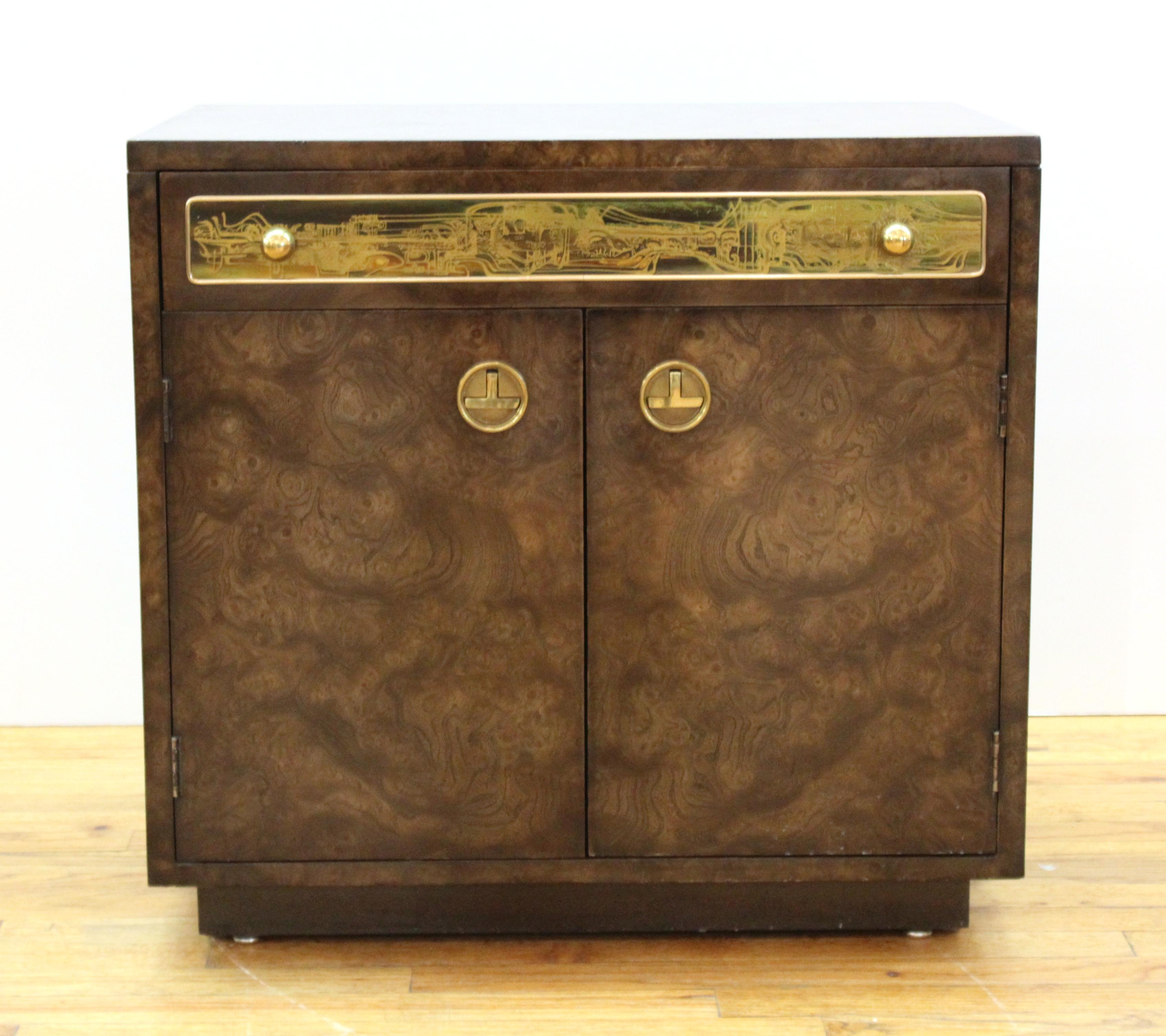 Mid-Century Modern pair of nightstands in burl wood with acid etched brass panel detailing, made by Mastercraft in the 1970's. In great vintage condition with age-appropriate wear and use.
Can be sold individually at $2800 each.