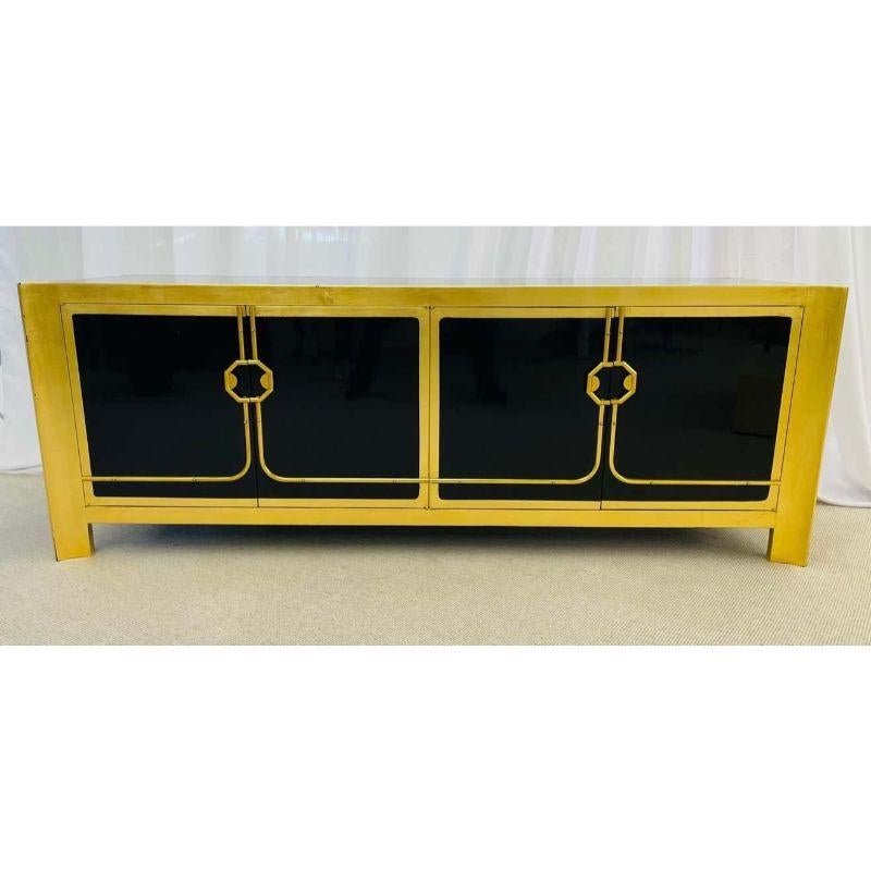 Mastercraft, Mid-Century Modern, Gilt, Ebonized Sideboard, USA, 1960s

A Mastercraft Mid-Century Modern sideboard. Ebony and gilt gold. A sleek and stylish Asian inspired sideboard cabinet by this highly sought after designer. The case having four