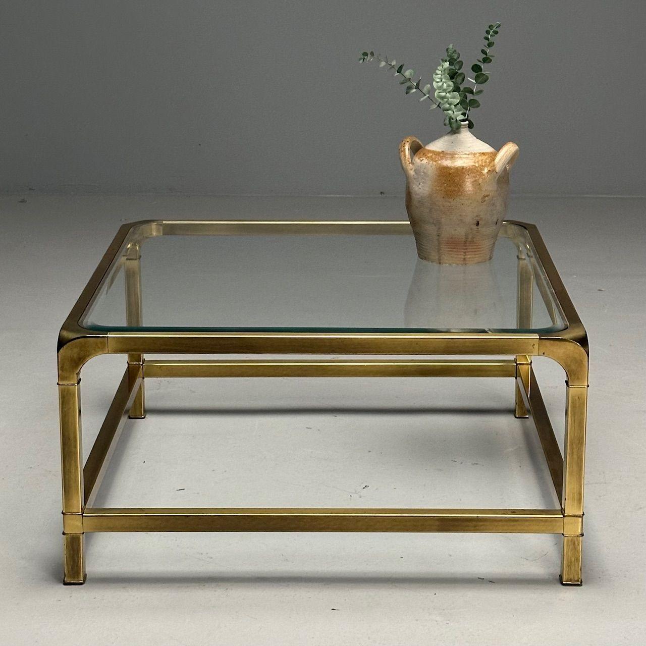 Mastercraft, Mid-Century Modern, Square Coffee Table, Brass, Glass, USA, 1970s

Square coffee table designed by Mastercraft Furniture and produced in the United States circa 1970s. This example features a patinated brass frame with rounded edges,