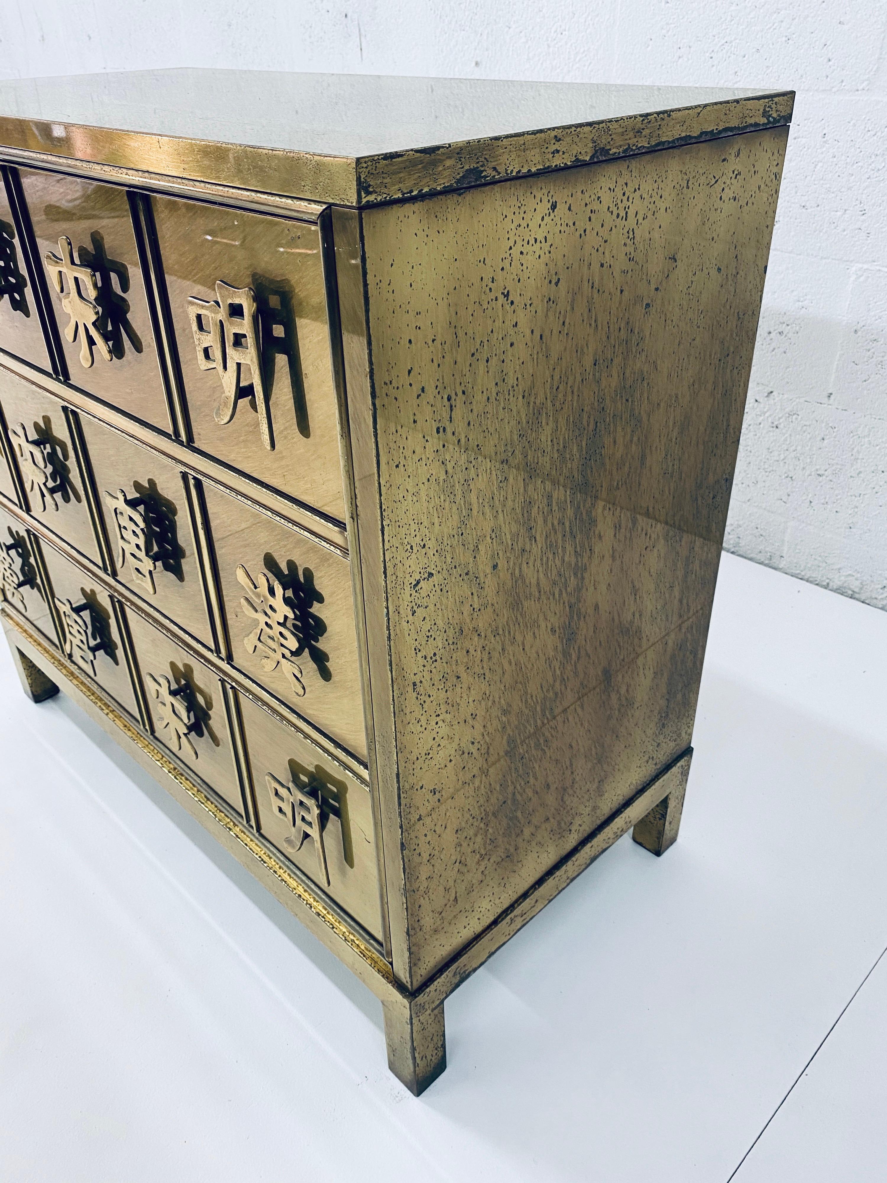 American Mastercraft Patinated Brass “Four Dynasty’s” Commode