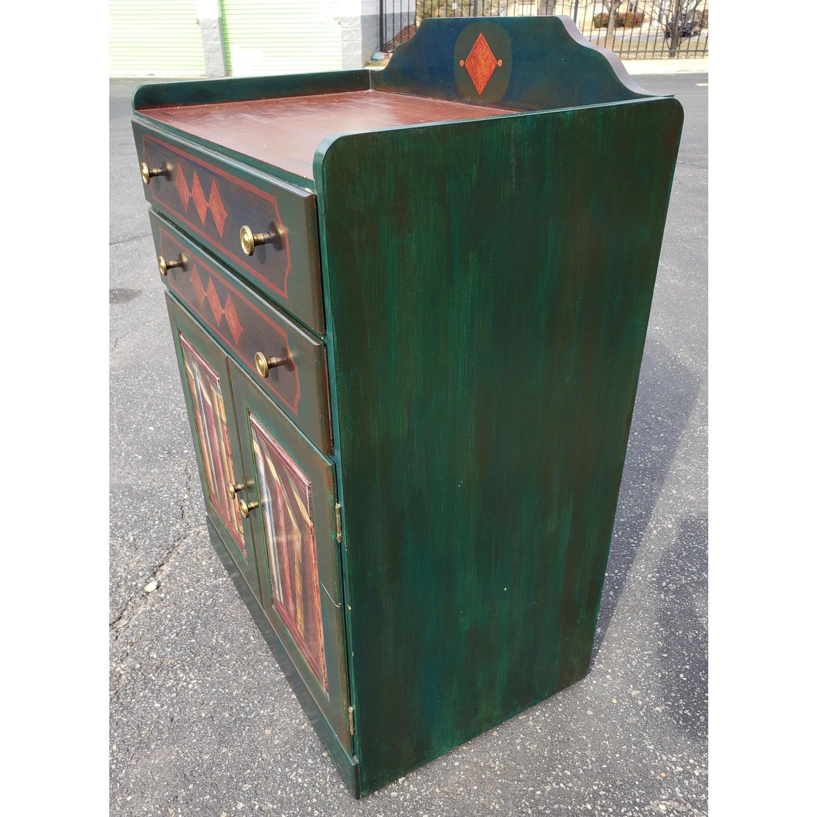 Vintage hand painted storage cabinet from S J Bailey and Sons Mascraft unfinished furniture. 
The cabinet features two large storage drawers with dovetail drawers and a large storage space below the drawers. The cabinet is made out of light pined