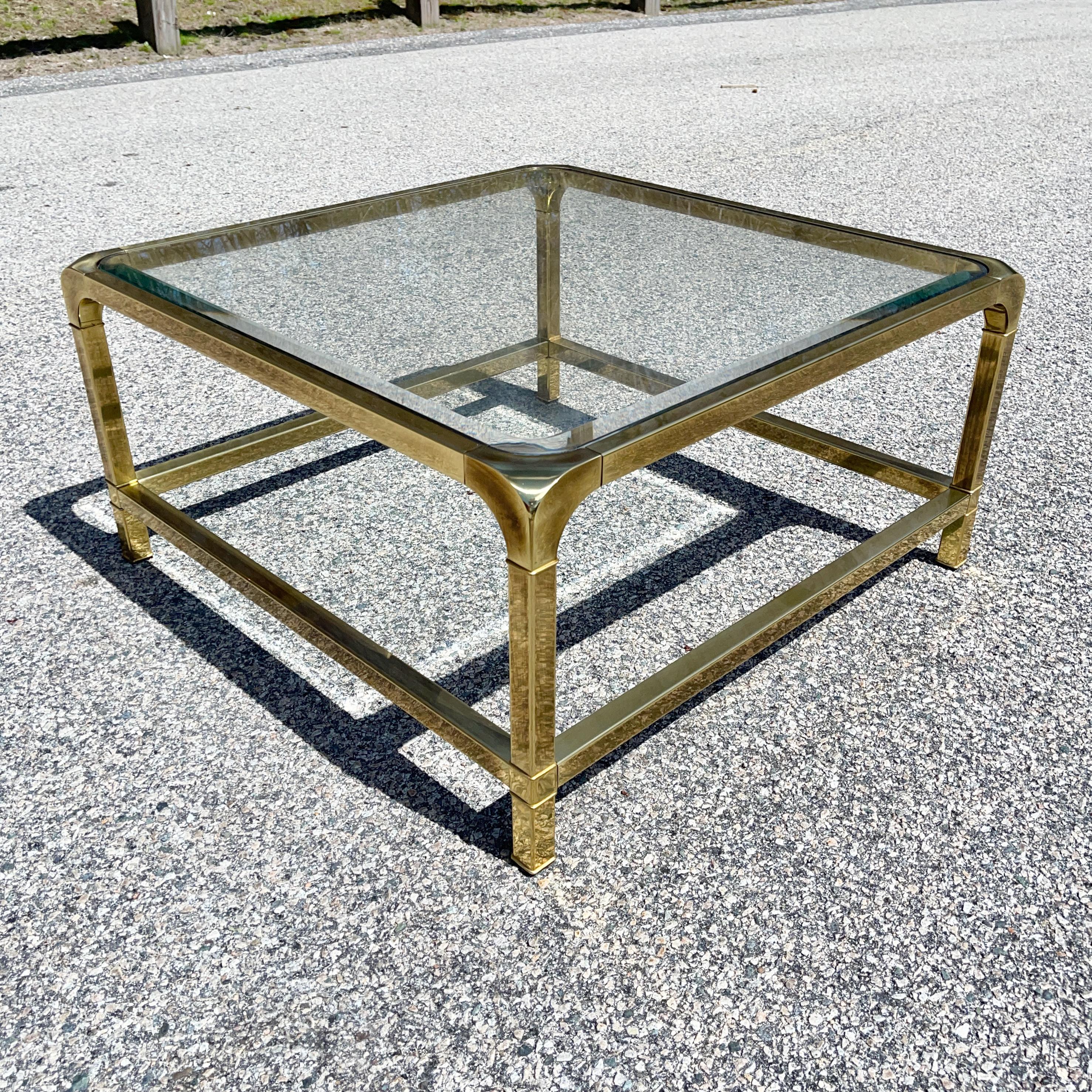 Mastercraft Furniture Co. model 1310 square brass frame cocktail table with inset clear glass top designed by William Doezema early 1970's.

    
