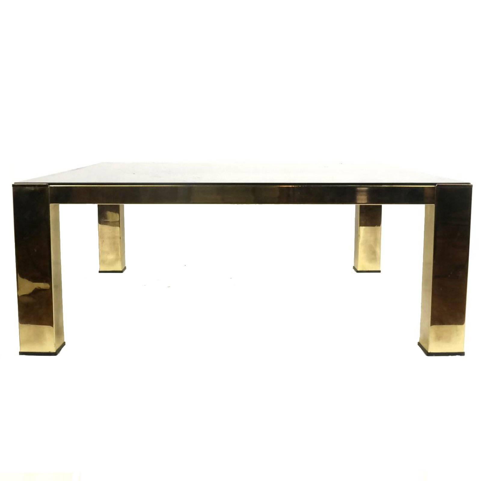 Mastercraft style brass and glass cocktail table.