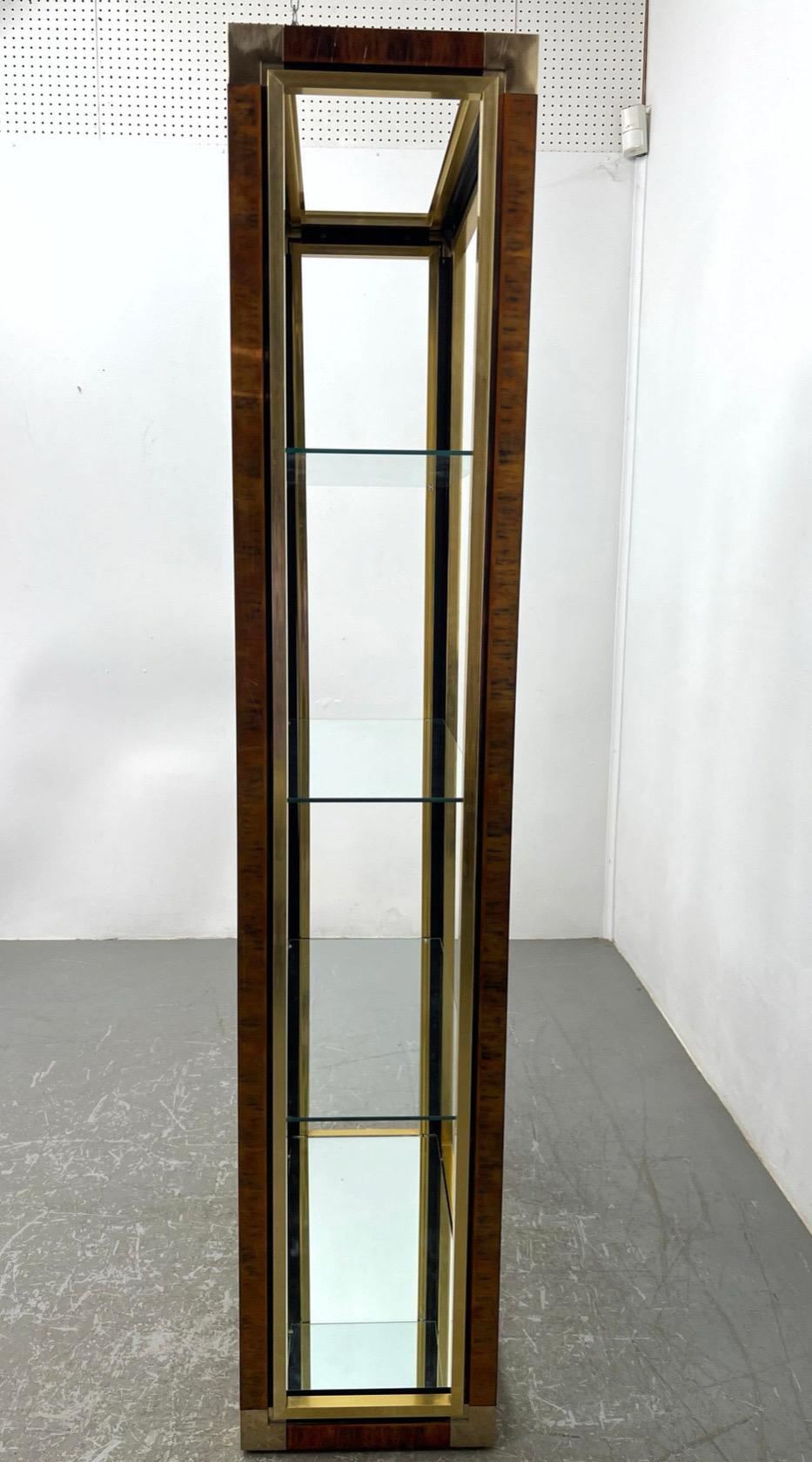 Brass & Tortoise Etagere in the style of Mastercraft. 

USA, circa 1970-1980.

Dimensions: Height: 
72 inches H x 30 inches W x  14 inches D
