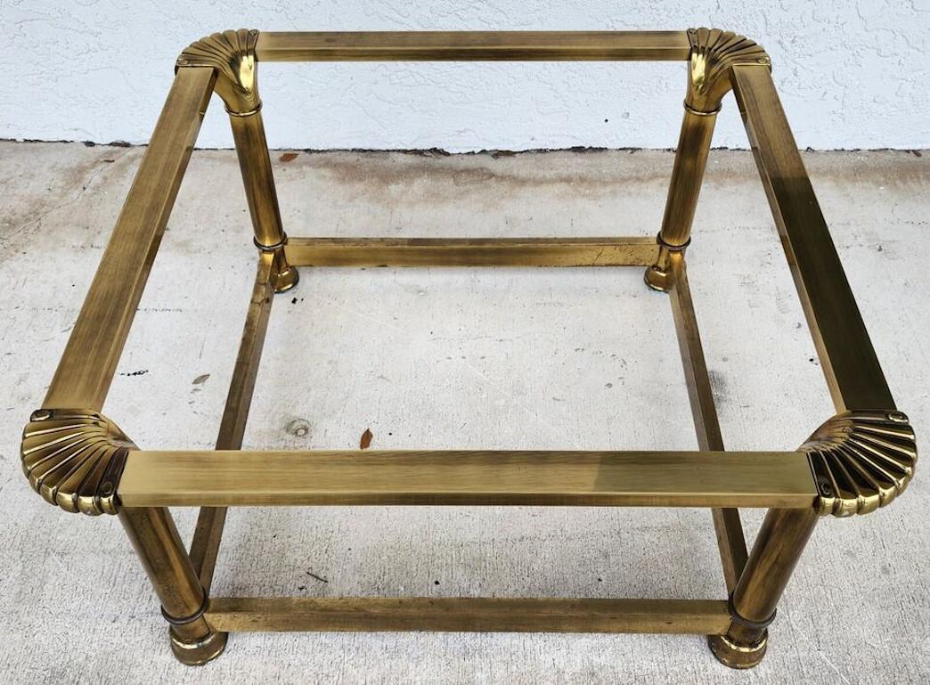 For FULL item description click on CONTINUE READING at the bottom of this page.

Offering One Of Our Recent Palm Beach Estate Fine Furniture Acquisitions Of A
Mastercraft Italian Style Brass & Glass Coffee Table 1970s

Approximate Measurements in