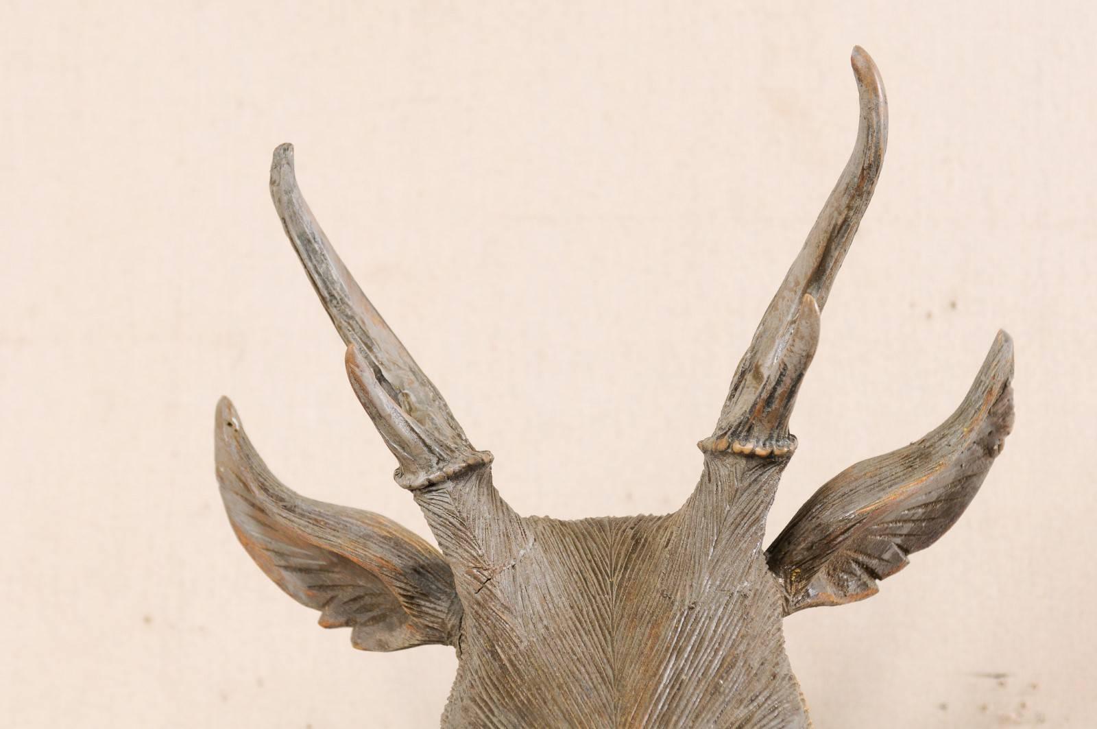Masterfully Carved Faux-Taxidermy Deer Head Wall Decoration In Good Condition For Sale In Atlanta, GA