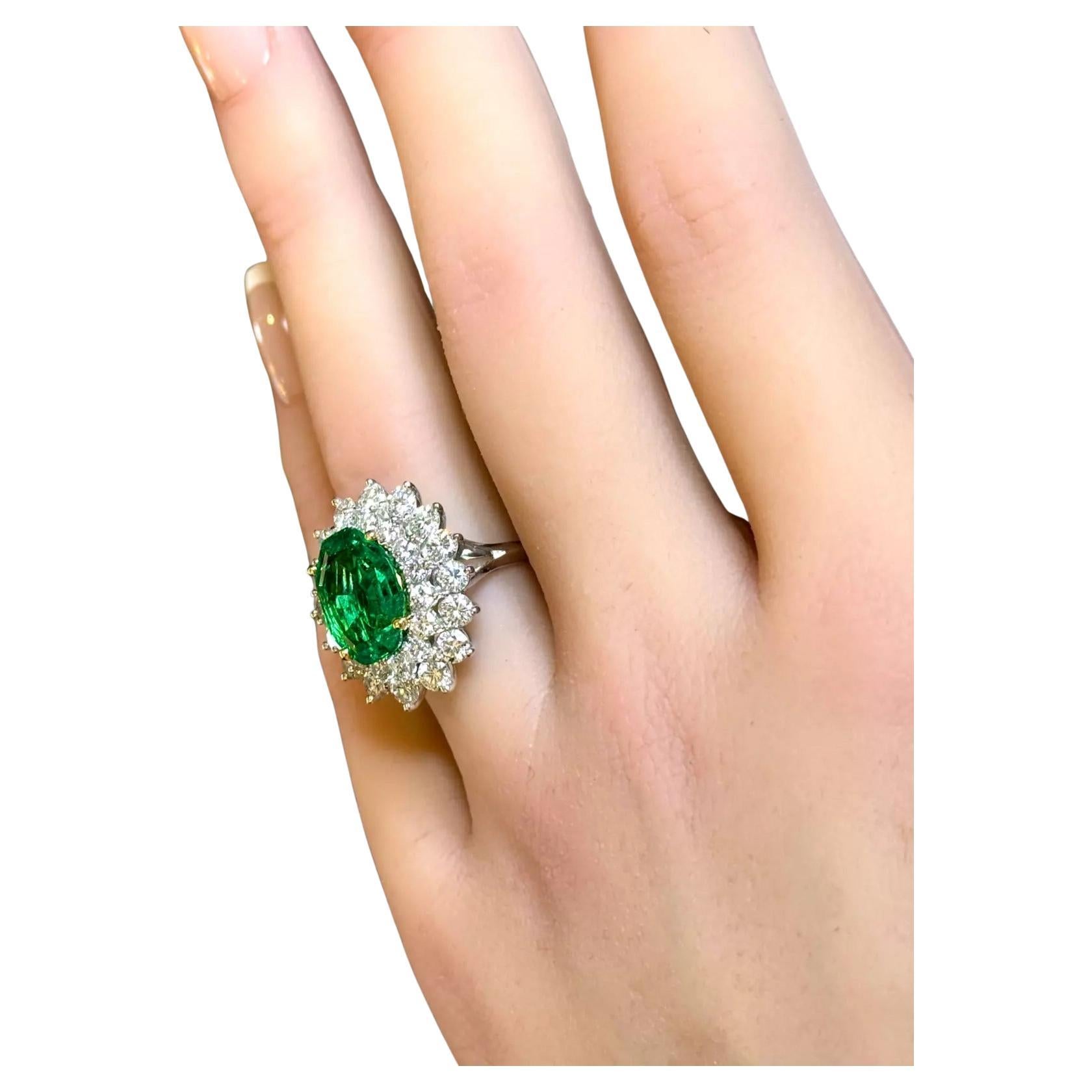 Presenting an extraordinary Tiffany & Co. Platinum & Emerald Ring, a masterpiece of timeless elegance and craftsmanship.

Brand: Tiffany & Co.
Metal: 90% Platinum / 10% Iridium
Ring Size: 6
Weight: 7.8 grams
Top Dimensions: 21.5 mm (height) x 18.8