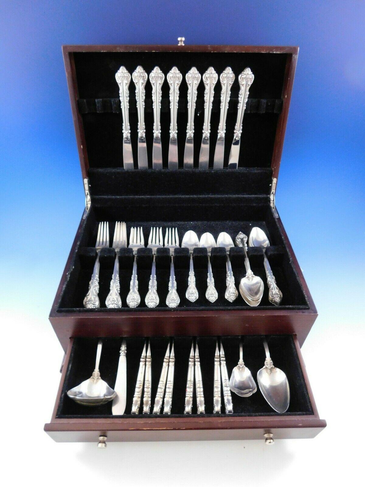 Masterpiece by International (handles not pierced) sterling silver flatware set - 52 pieces. This set includes:

8 knives, 9 1/4
