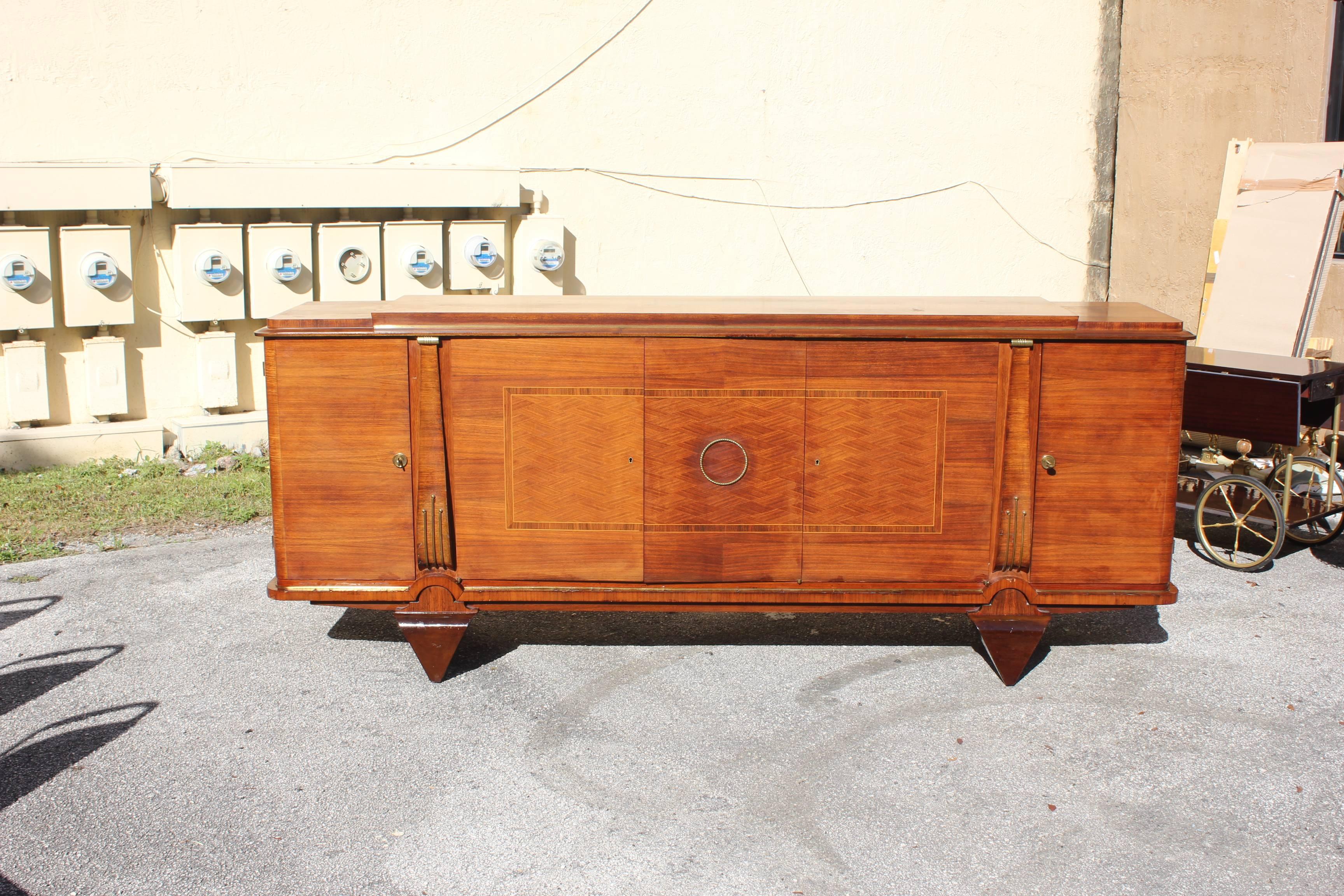 Masterpiece French Art Deco sideboard or buffet rosewood by Jules Leleu, circa 1940s. Very fine craftsmanship and beautiful detail ,the sideboard are with the original finish in very good condition but the piece need to be refinish , Please note