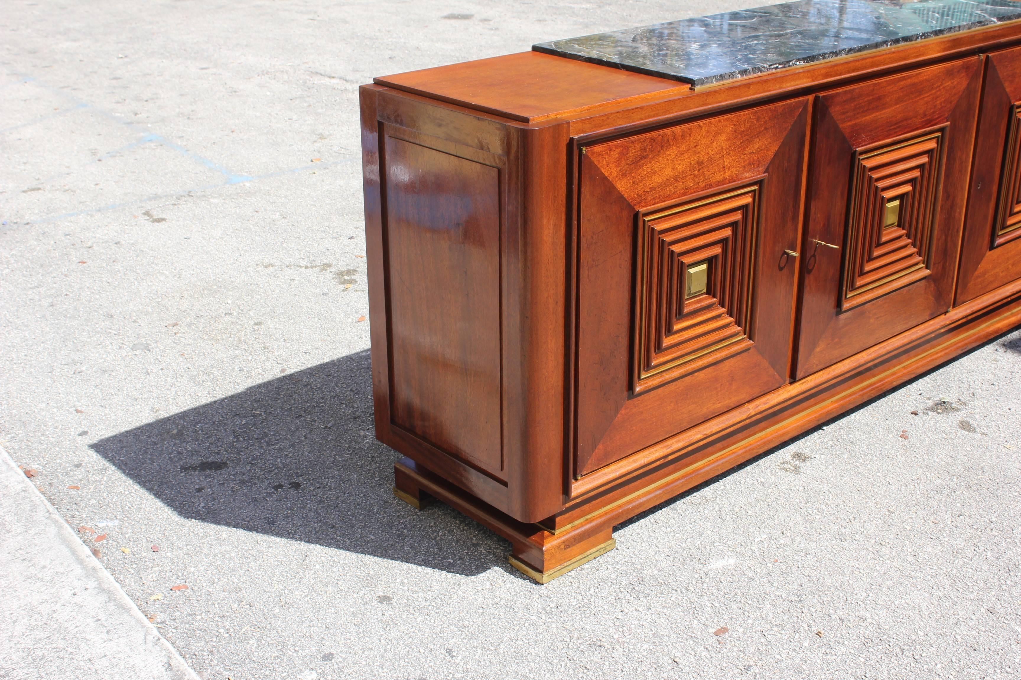 Master piece French Art Deco solid mahogany sideboard or buffet marble top by the famed architect / designer Maxime Old. Documented in book 
