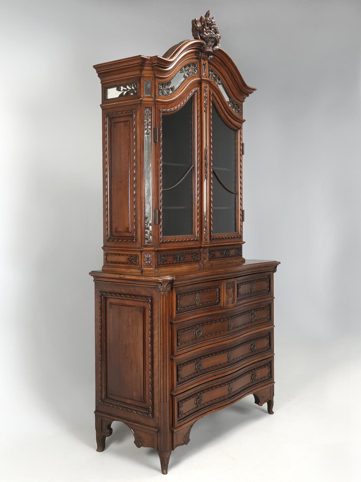 Masterpiece, French Hand-Carved Walnut China Cabinet of Unbelievable Quality In Good Condition For Sale In Chicago, IL